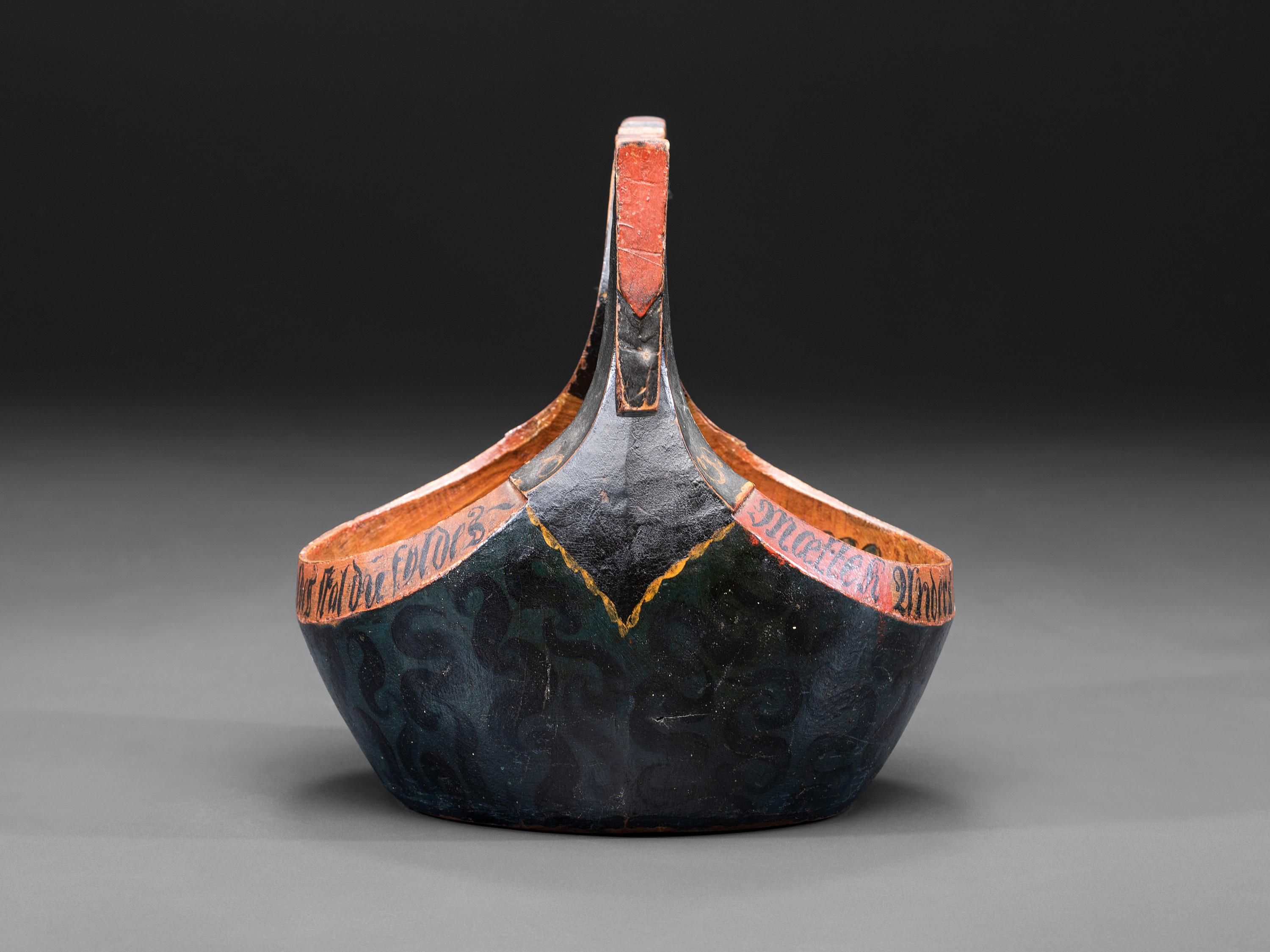 A Scandinavian Carved and Painted Wood Ale Bowl