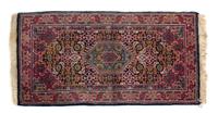 Two Persian Wool Rugs — 20TH CENTURY