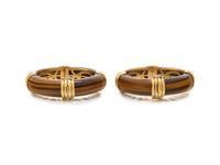 PAIR OF YELLOW GOLD AND TIGER'S EYE BANGLE BRACELETS