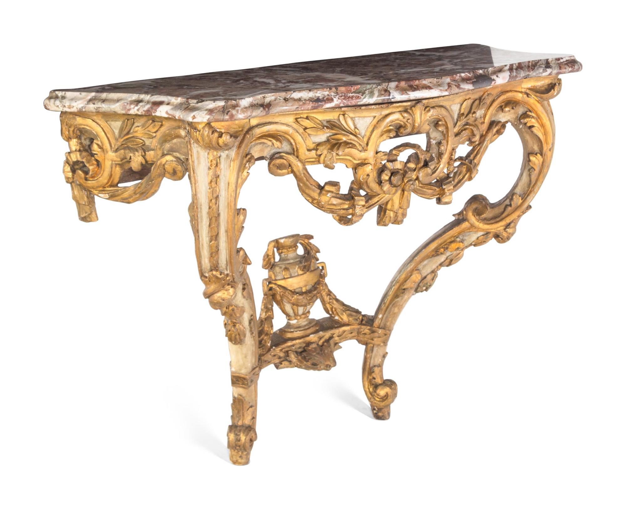 An Italian Rococo Parcel-Gilt and White-Painted Carved Wood Marble-Top Console Table