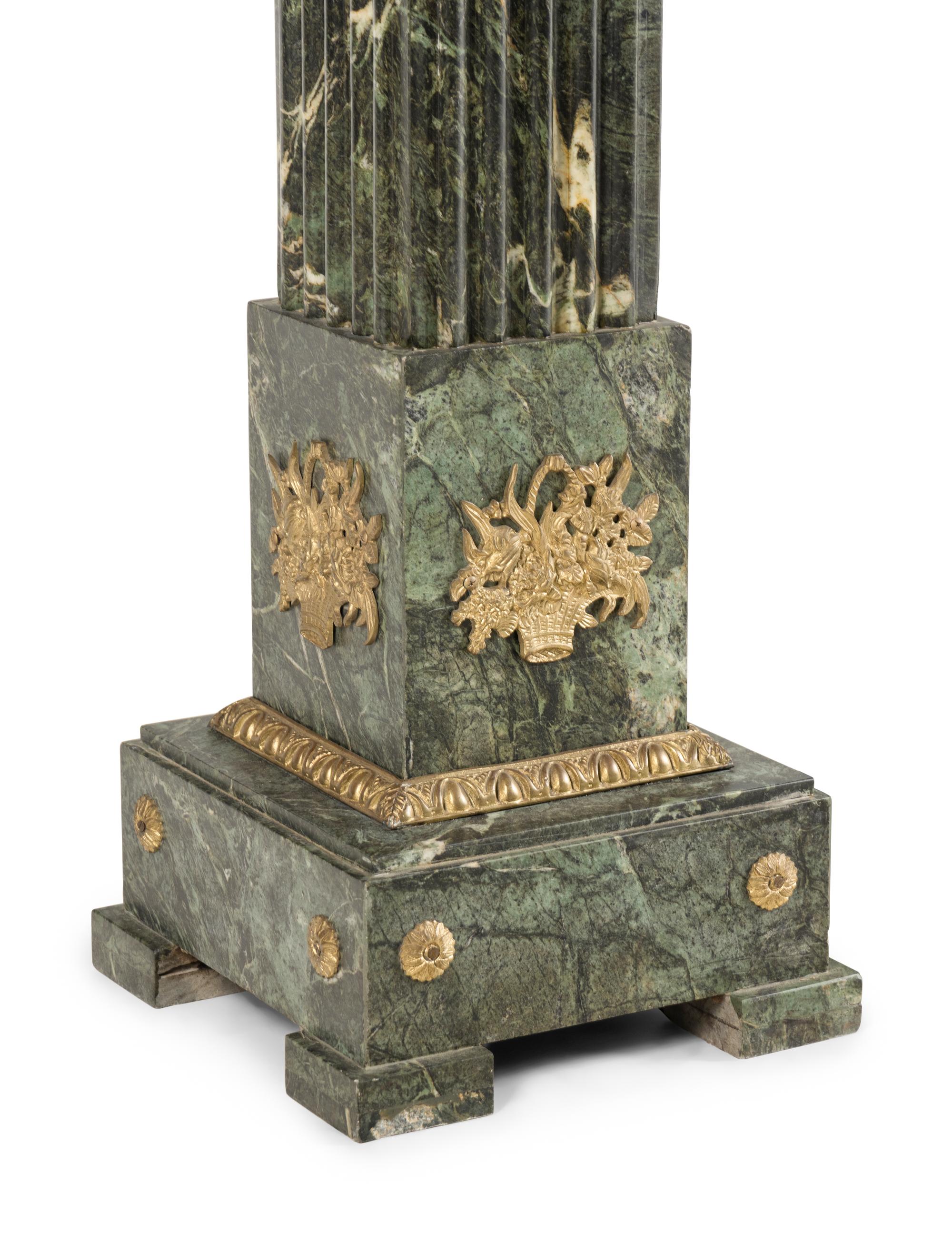 A Pair of Louis XVI Style Gilt Bronze Mounted Marble Pedestals