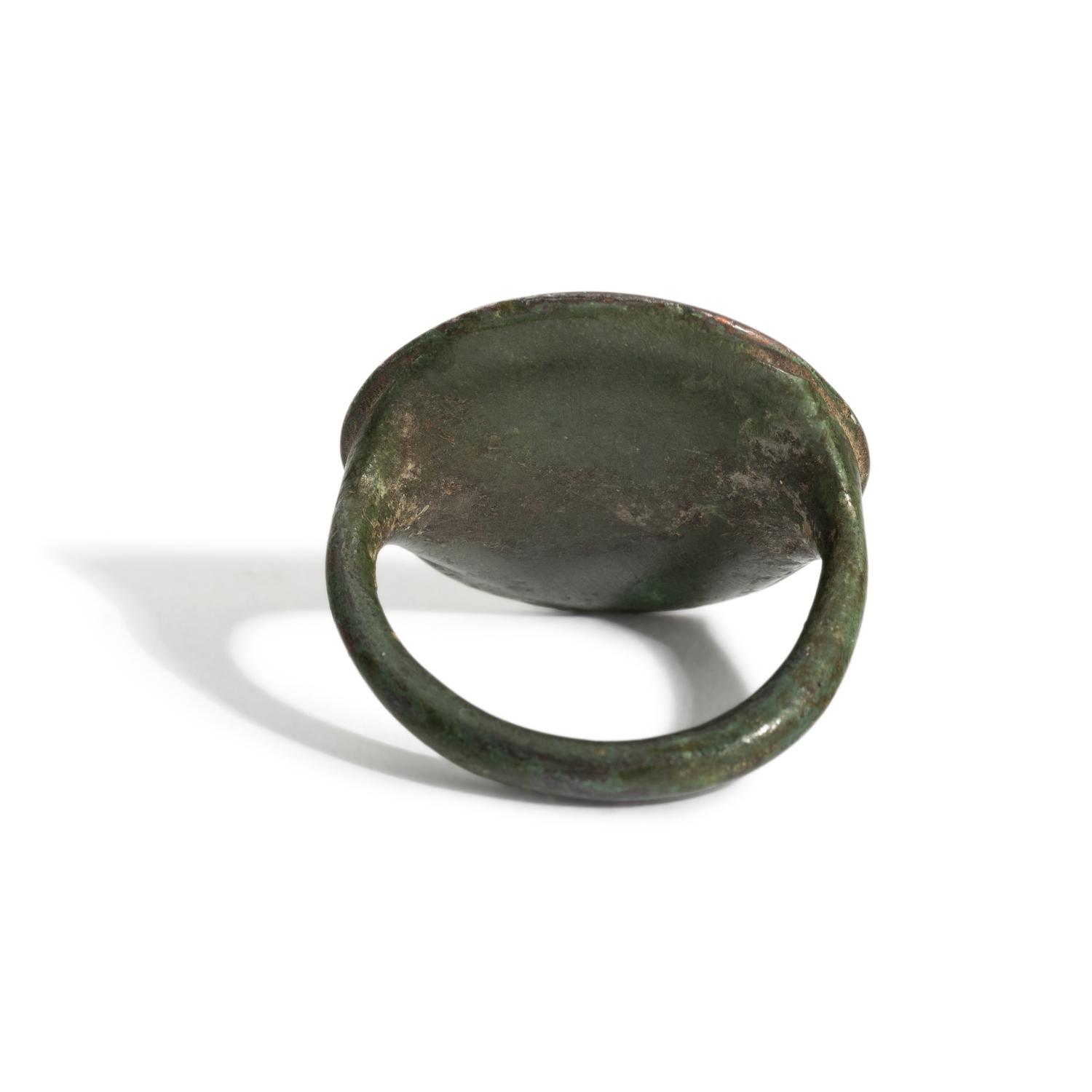 A Greek Bronze Finger Ring with Leda and the Swan or Aphrodite and her Dove