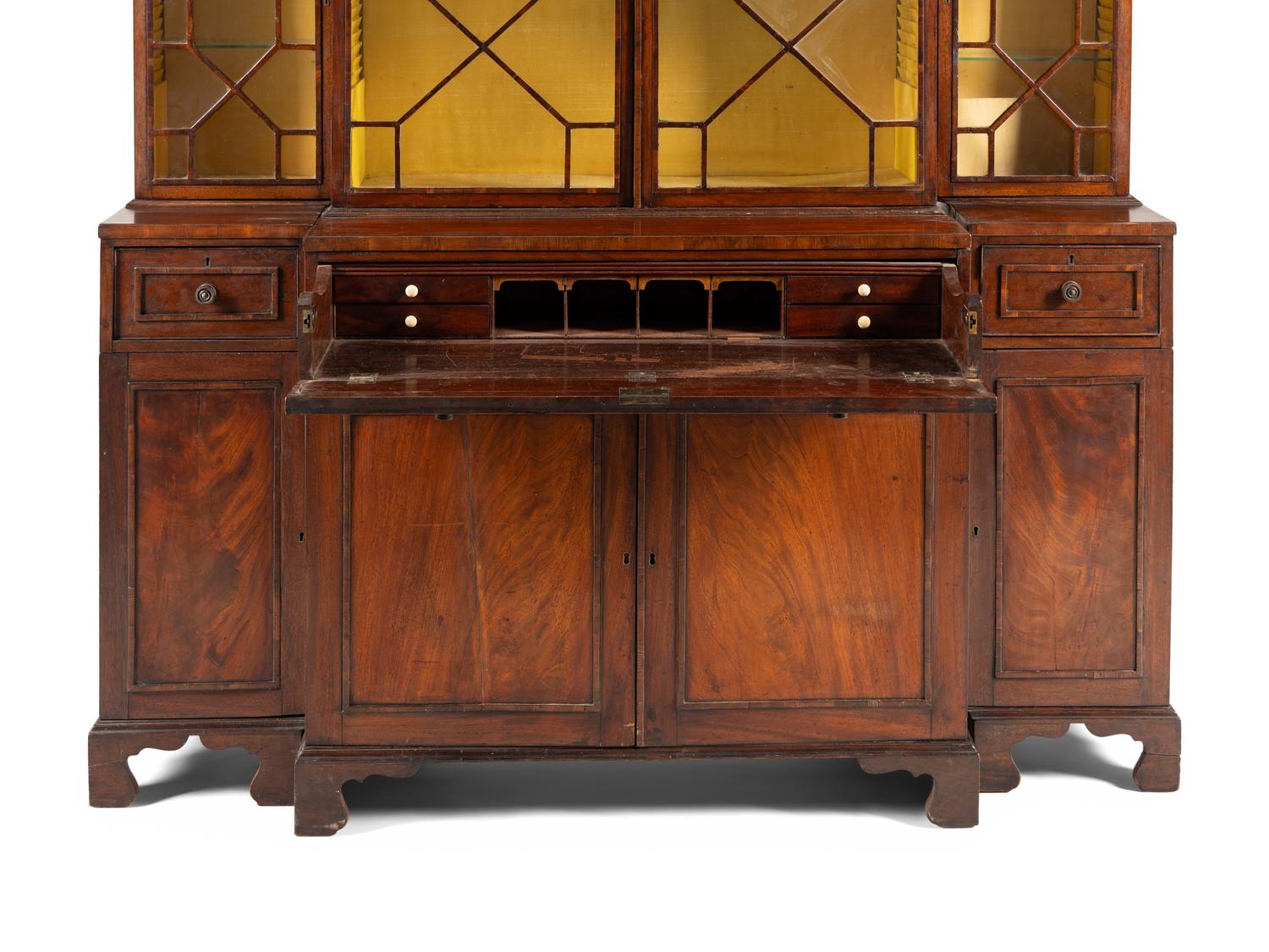 A George III Mahogany Breakfront Bureau Bookcase