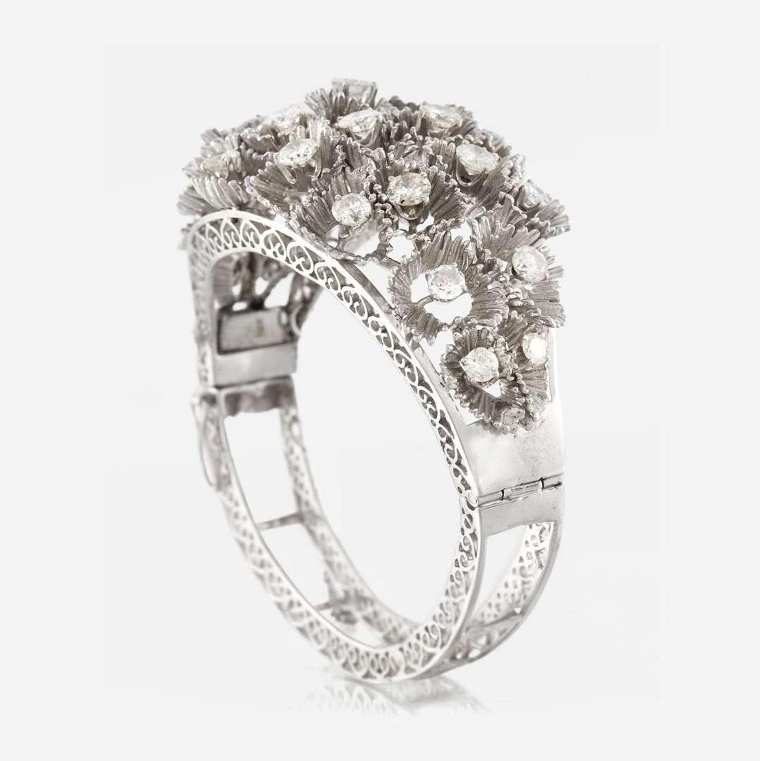 A white gold and diamond bangle