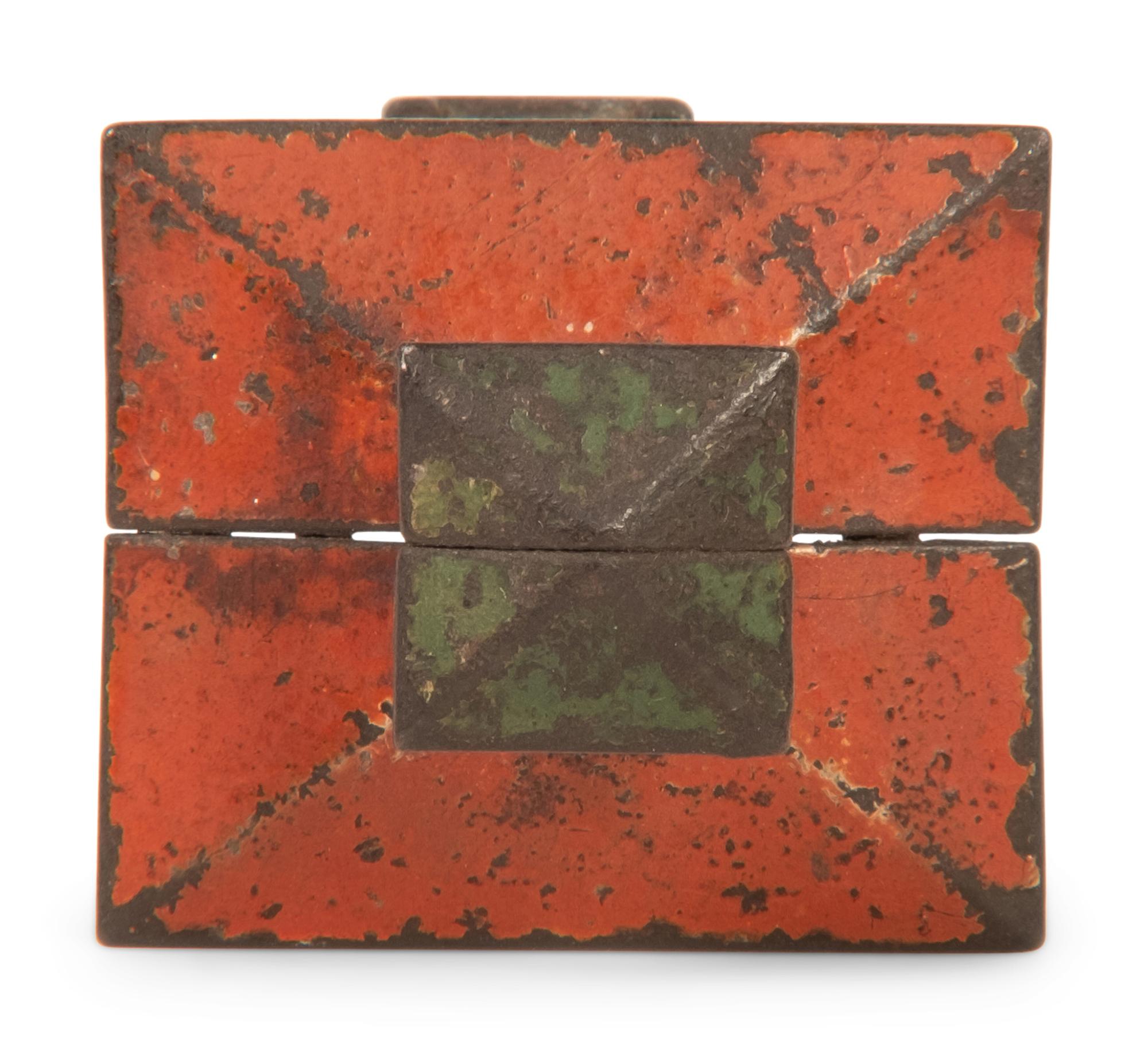 An Old Honesty Cast Iron Indian Cigar Bank, PLUS