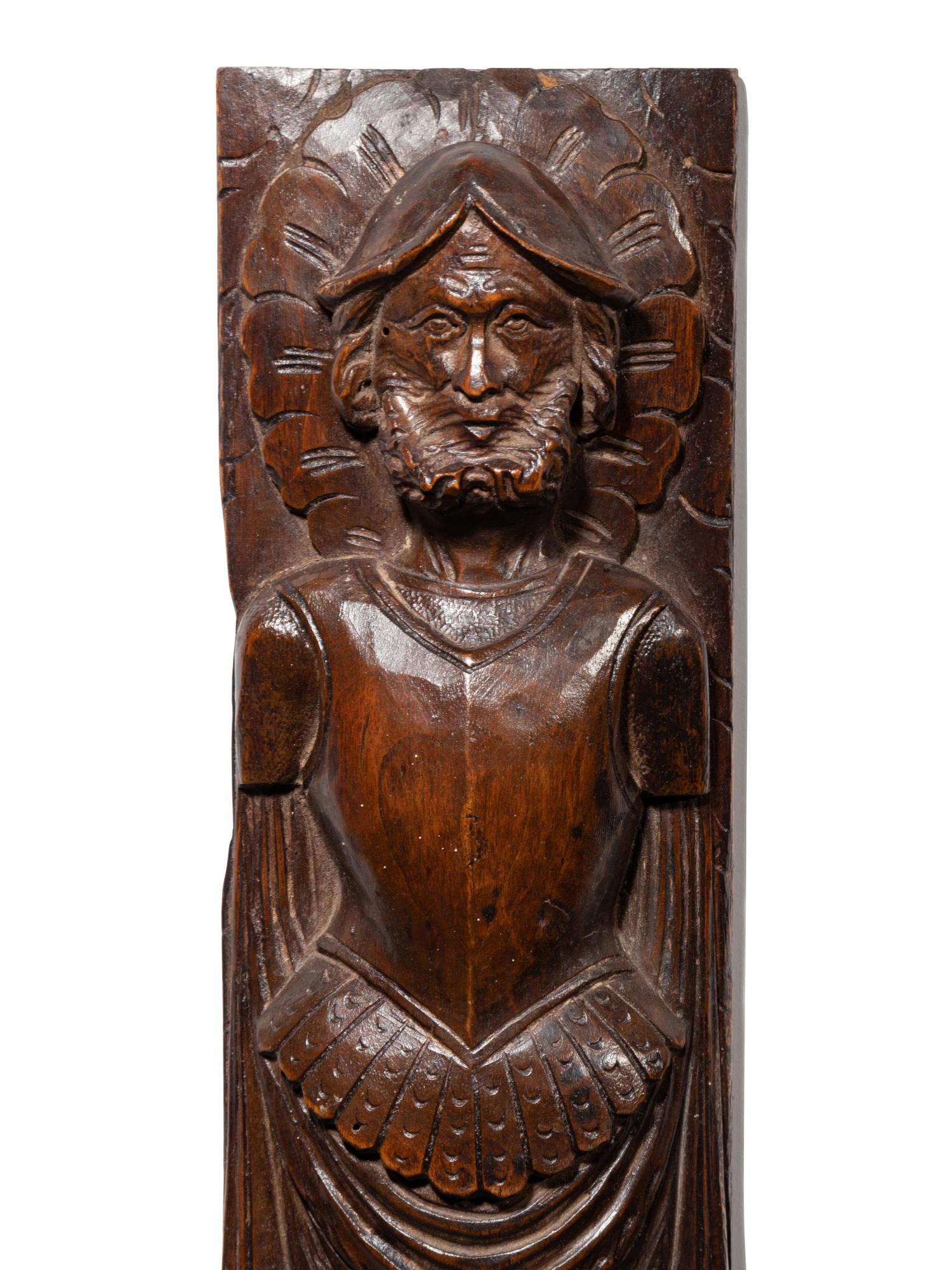 A Pair of Continental Carved Figural Pilasters