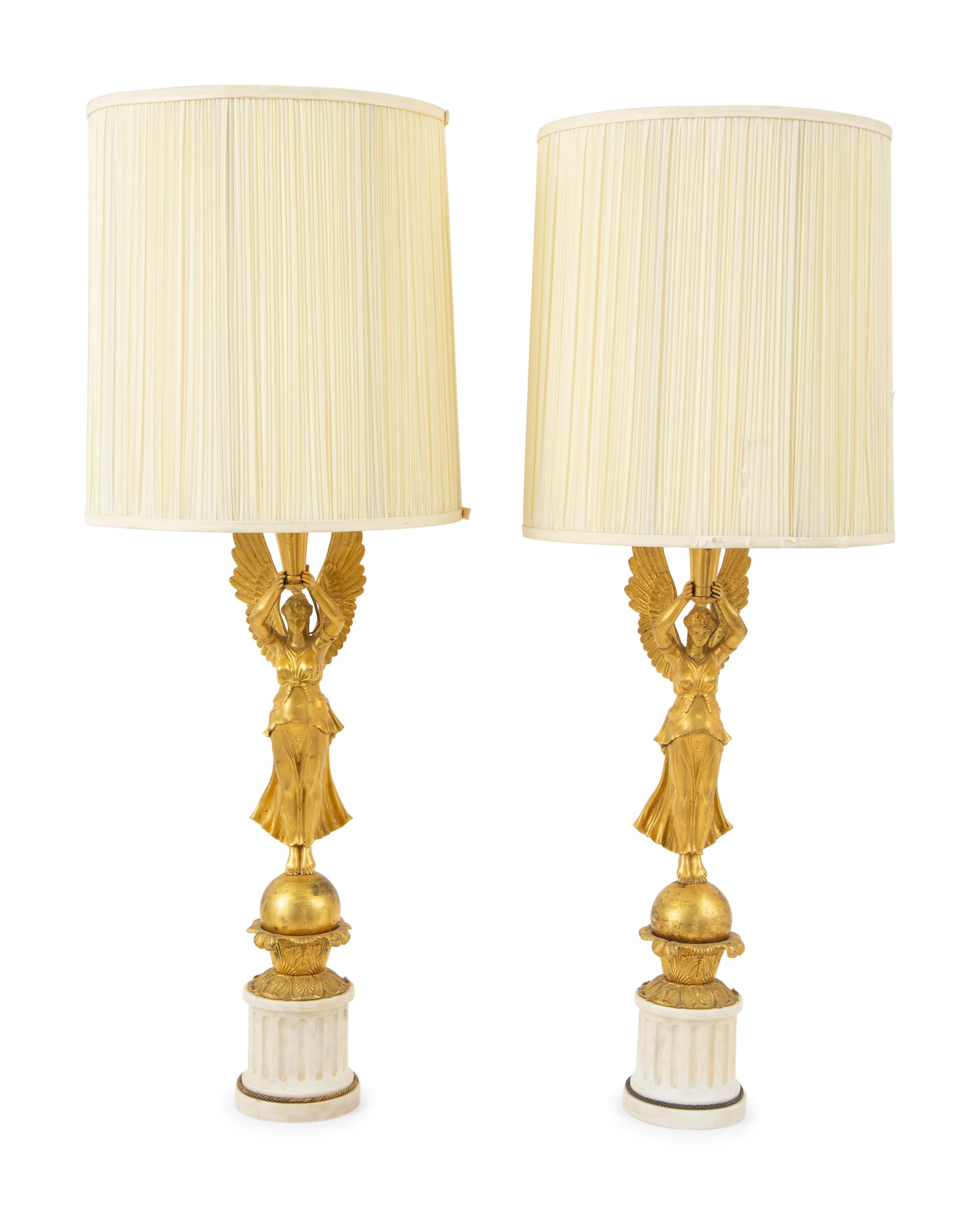 A Pair of Empire Style Gilt Bronze and White Marble Table Lamps
