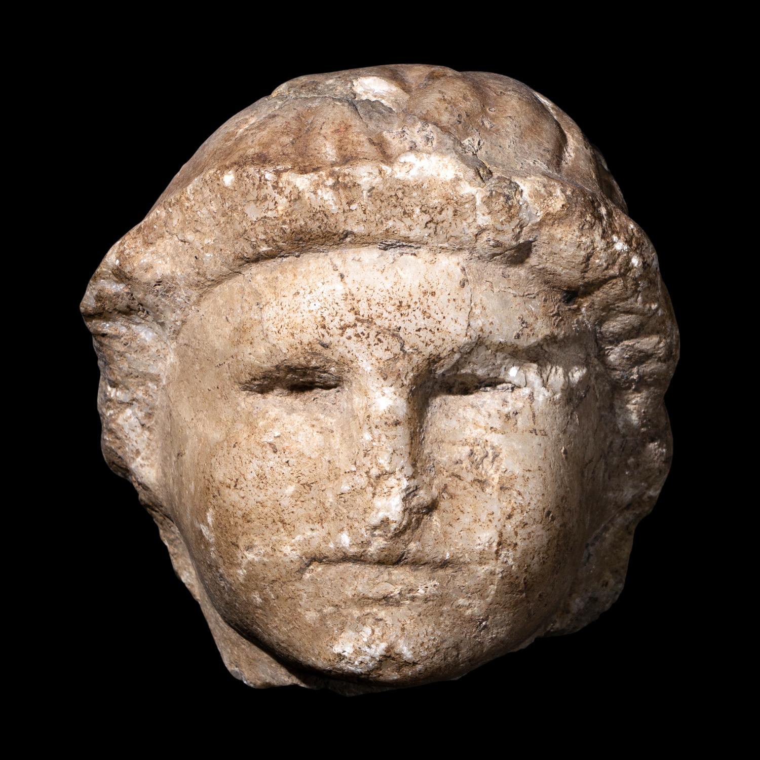 A Roman Marble Head of a Youth
