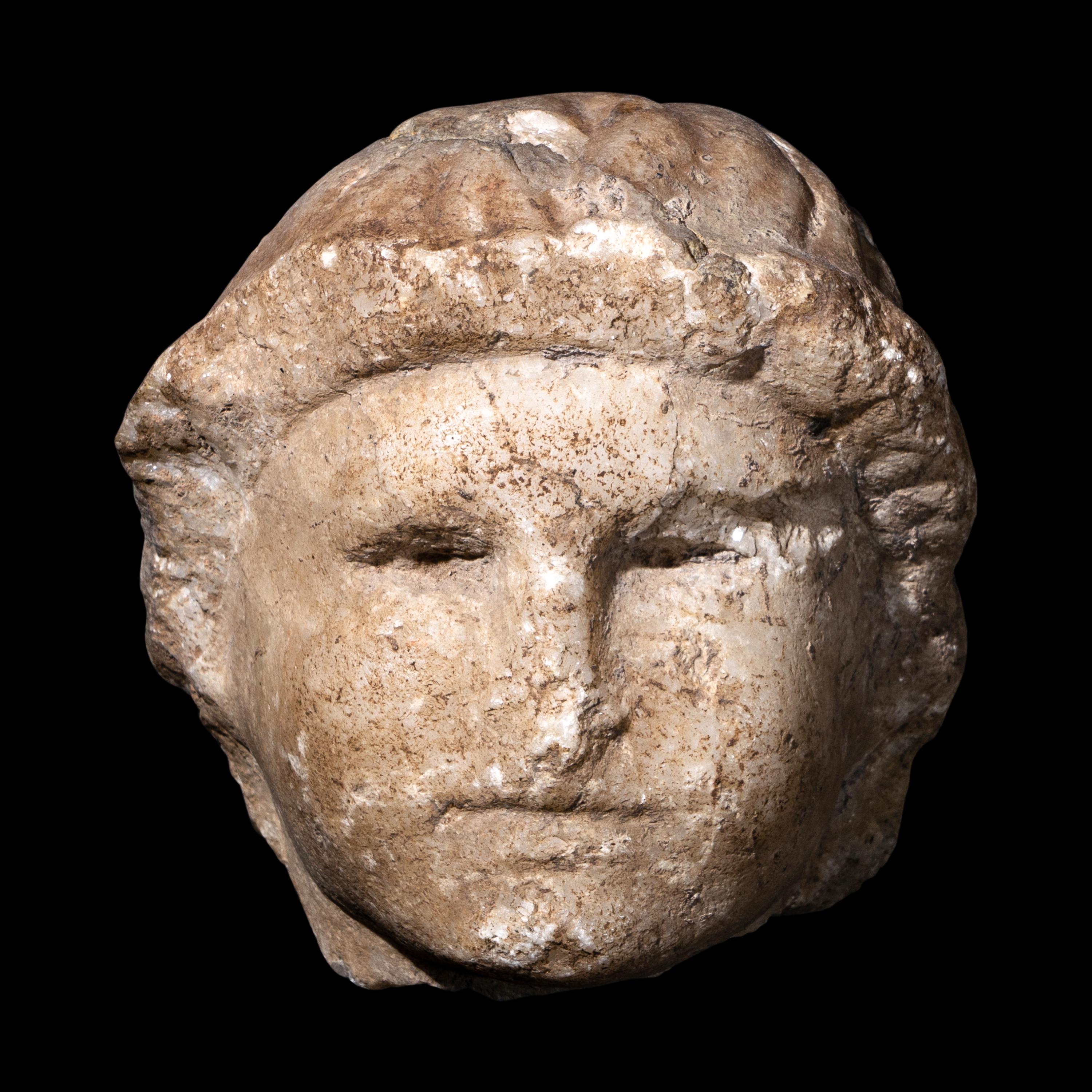 A Roman Marble Head of a Youth