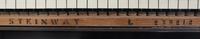 A Steinway and Sons Model L Ebonized Grand Piano