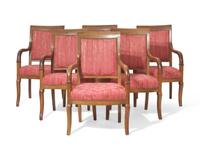 A set of six French Empire fruitwood fauteuils, circa 1825