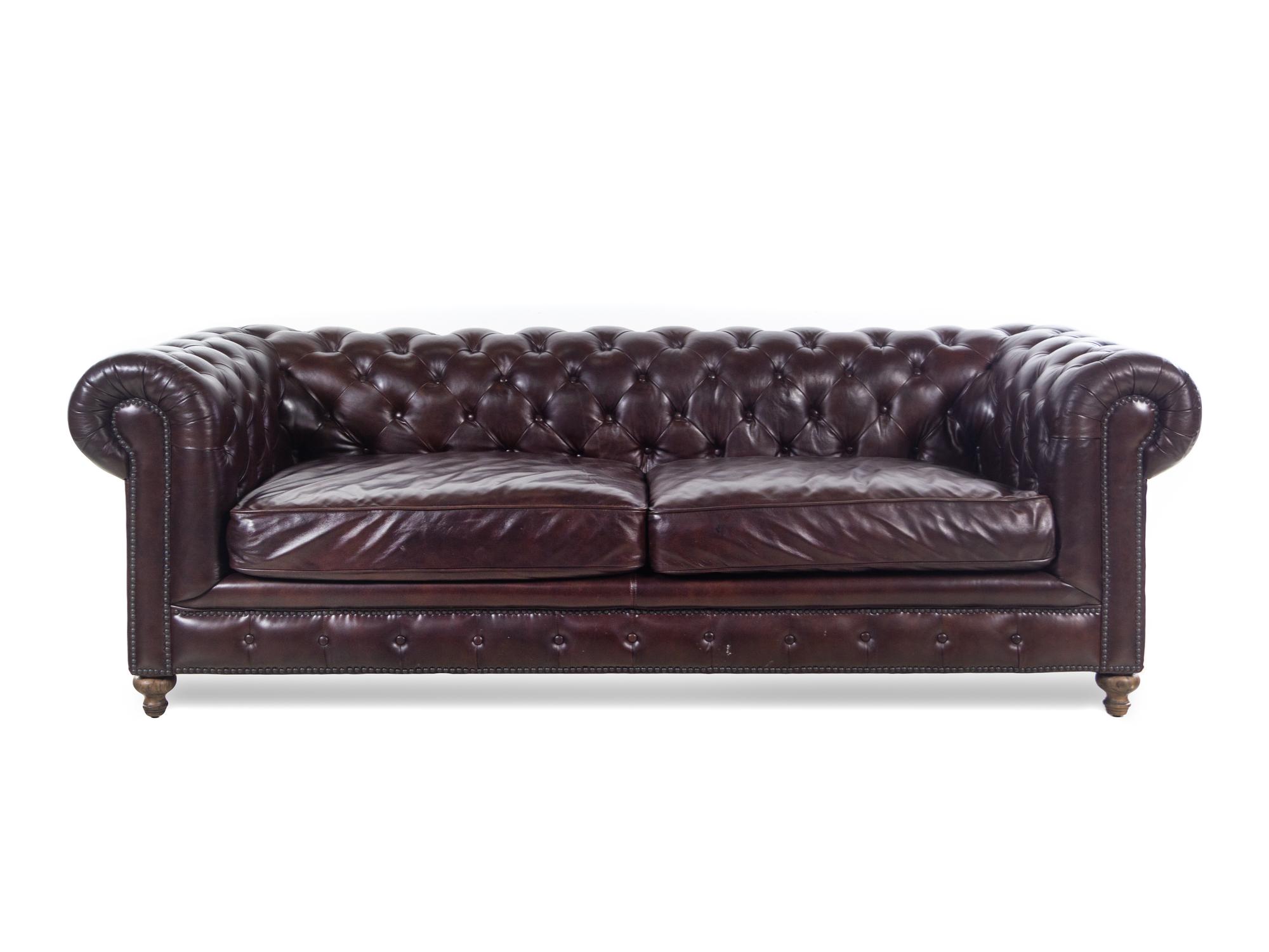 A Contemporary Tufted-Leather Upholstered Chesterfield Sofa