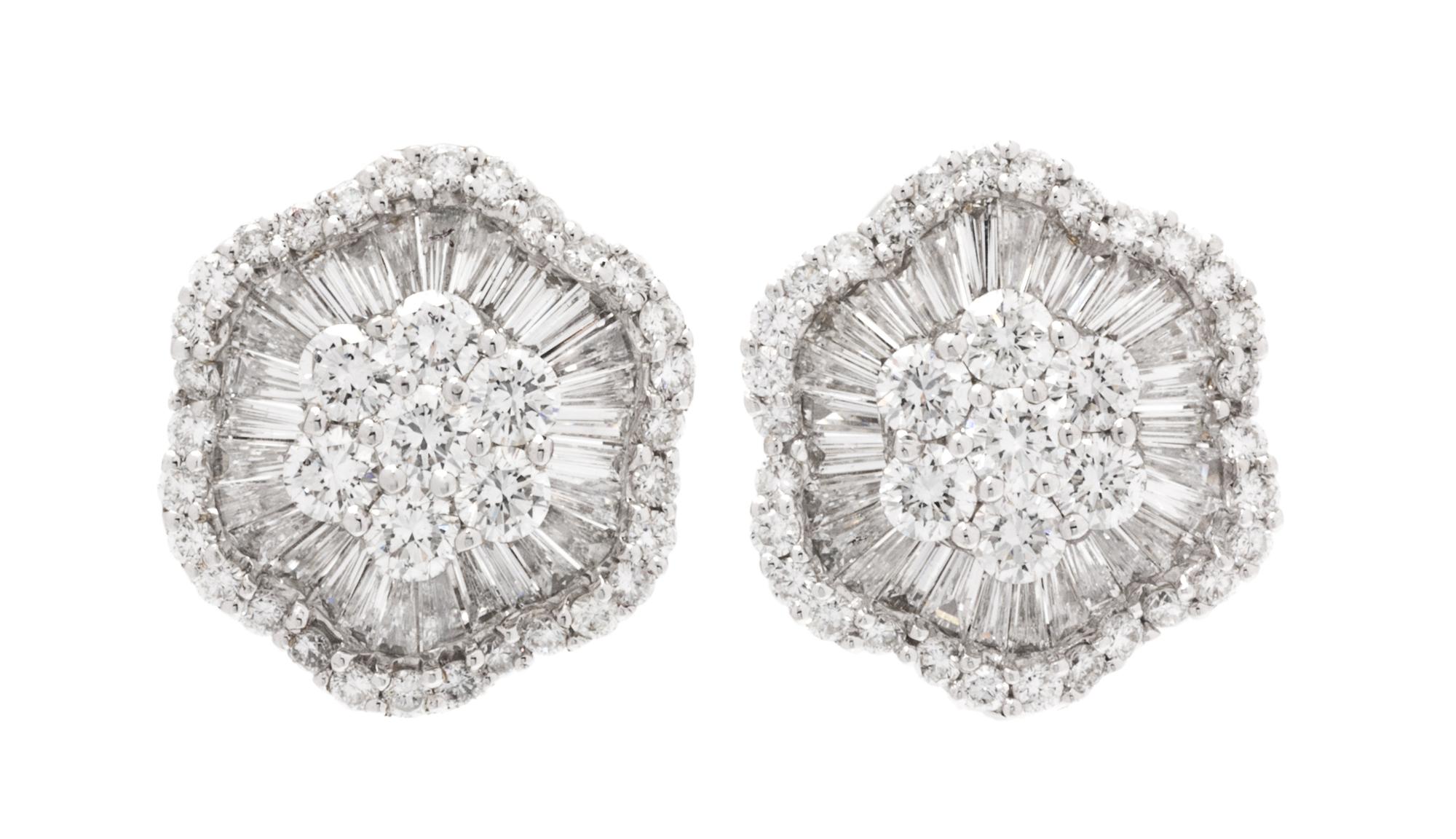A Pair of 18 Karat White Gold and Diamond Earclips, 6.30 dwts.