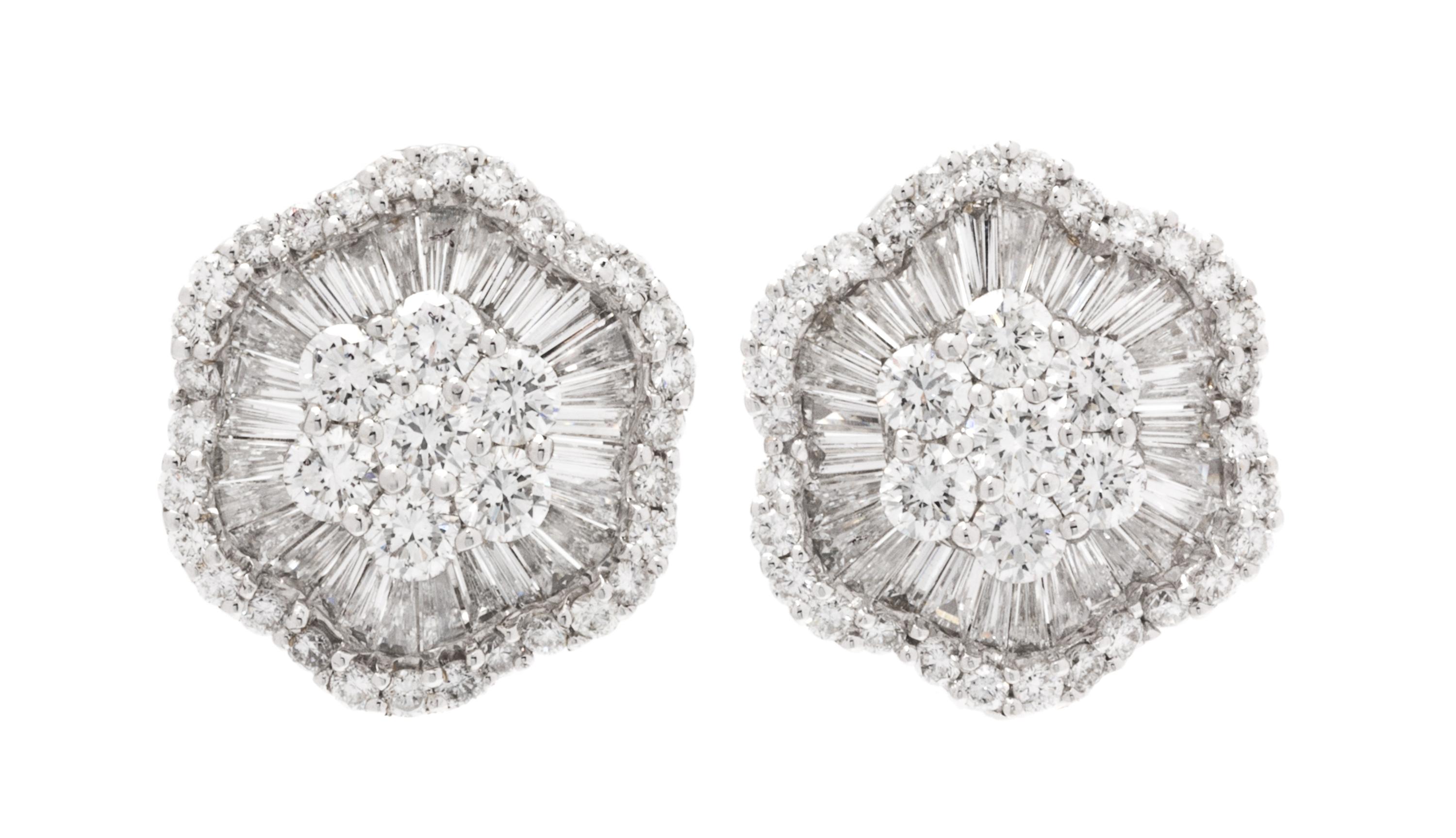 A Pair of 18 Karat White Gold and Diamond Earclips, 6.30 dwts.