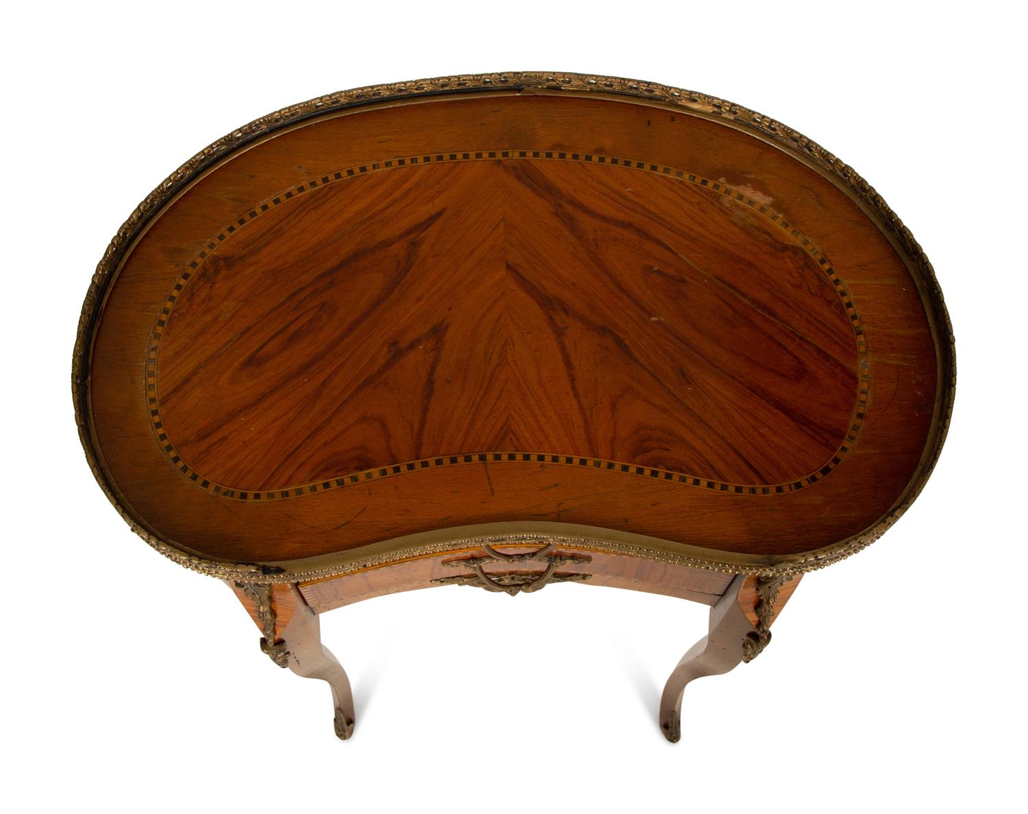 A Louis XV/XVI Transitional Style Gilt Metal Mounted Fruitwood Side Table