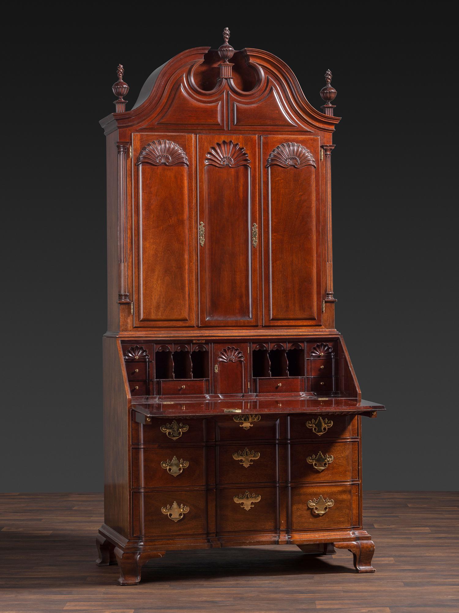 A Kindel Chippendale Revival Shell-and-Block Front Desk-and-Bookcase