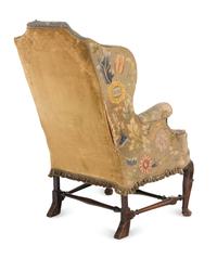 A Queen Anne Beechwood and Pine Wingback Armchair