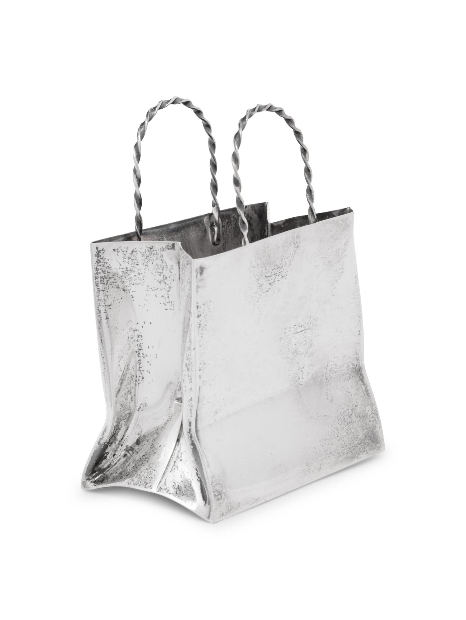 A Cartier Silver Table Article