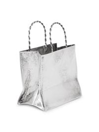 A Cartier Silver Table Article