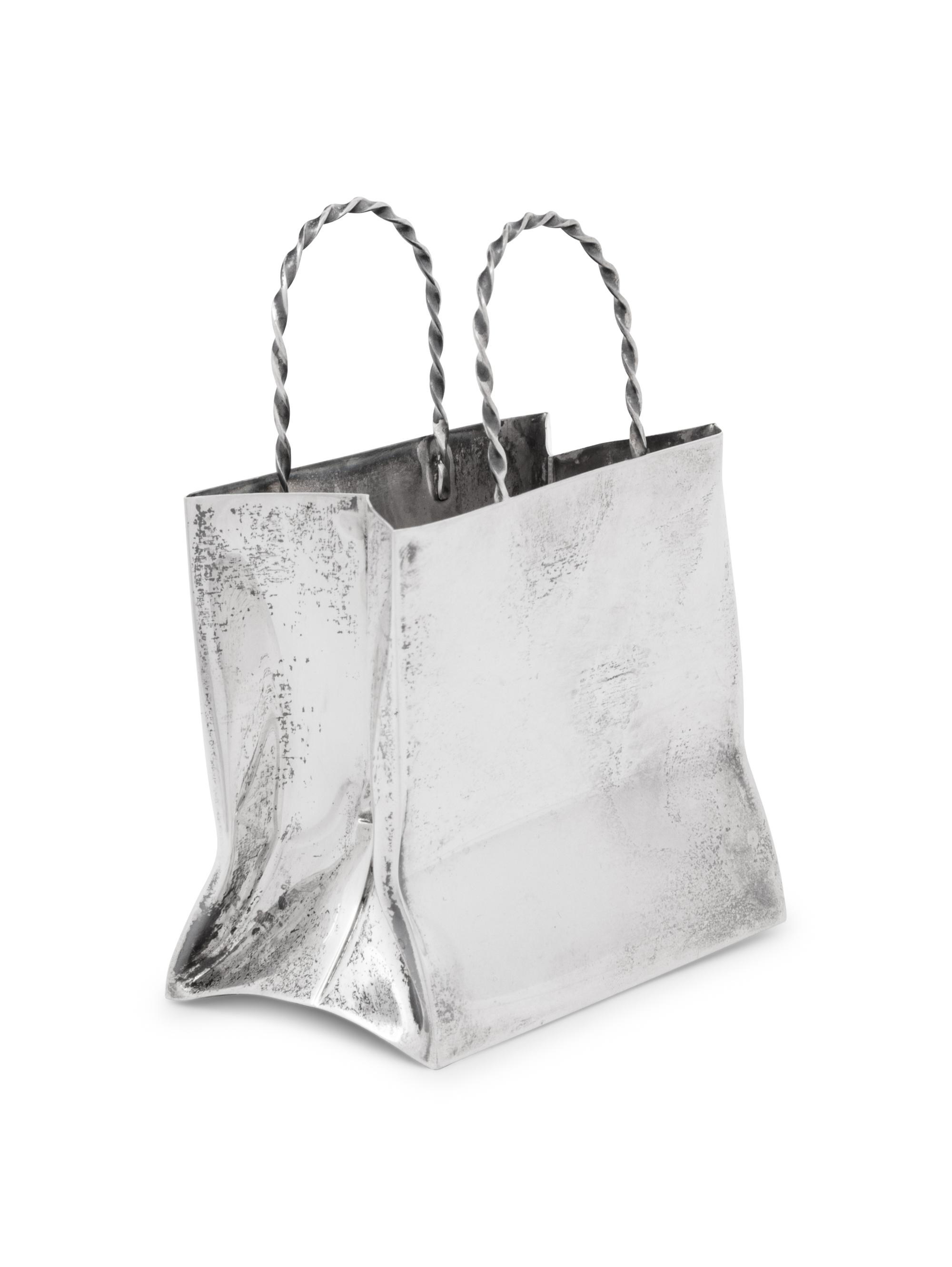 A Cartier Silver Table Article