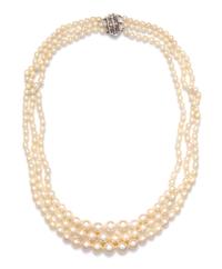 A 14 Karat White Gold and Graduated Cultured Pearl Multi Strand Necklace,
