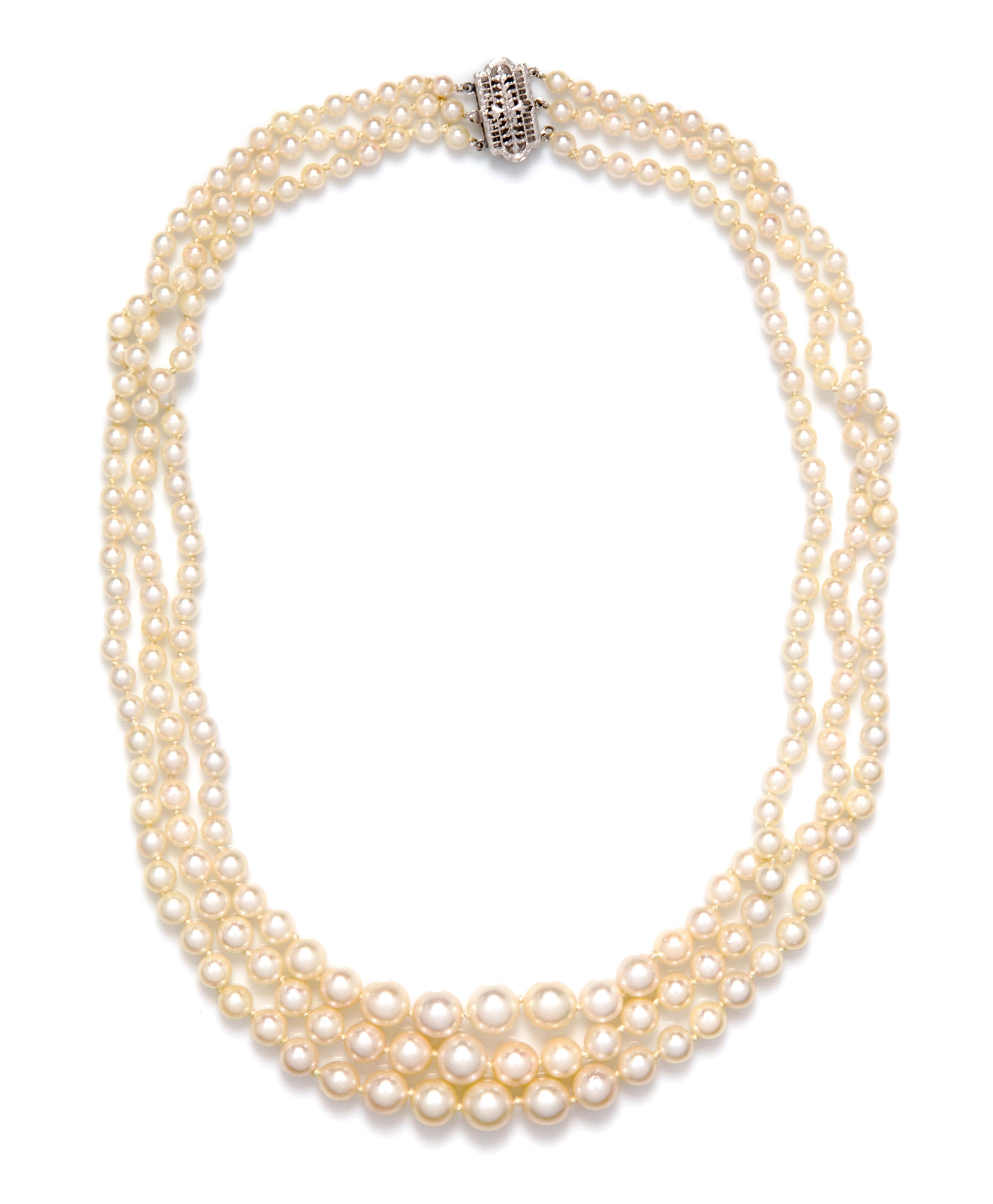 A 14 Karat White Gold and Graduated Cultured Pearl Multi Strand Necklace,
