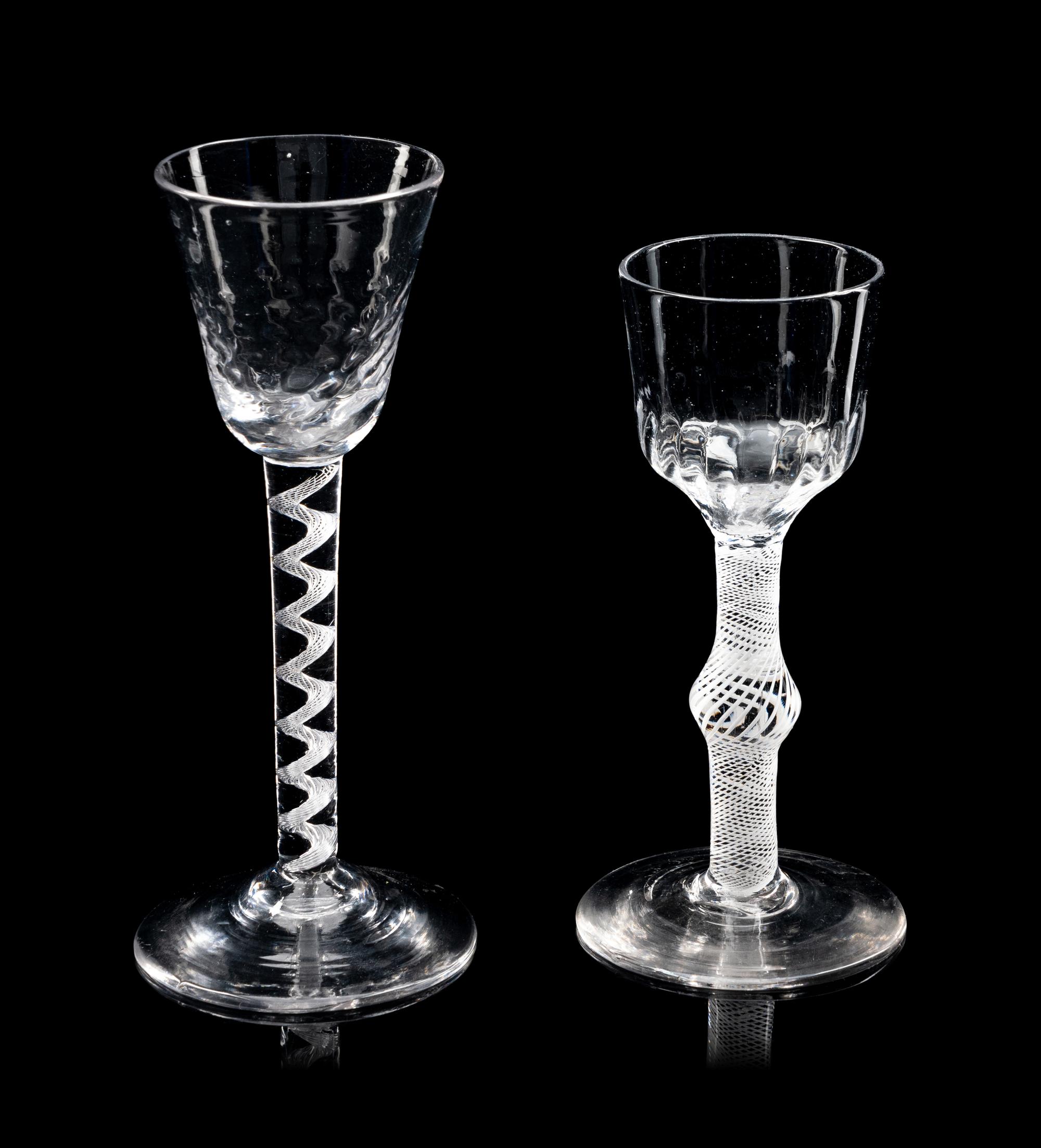 Two Moulded Glass Wine Glasses