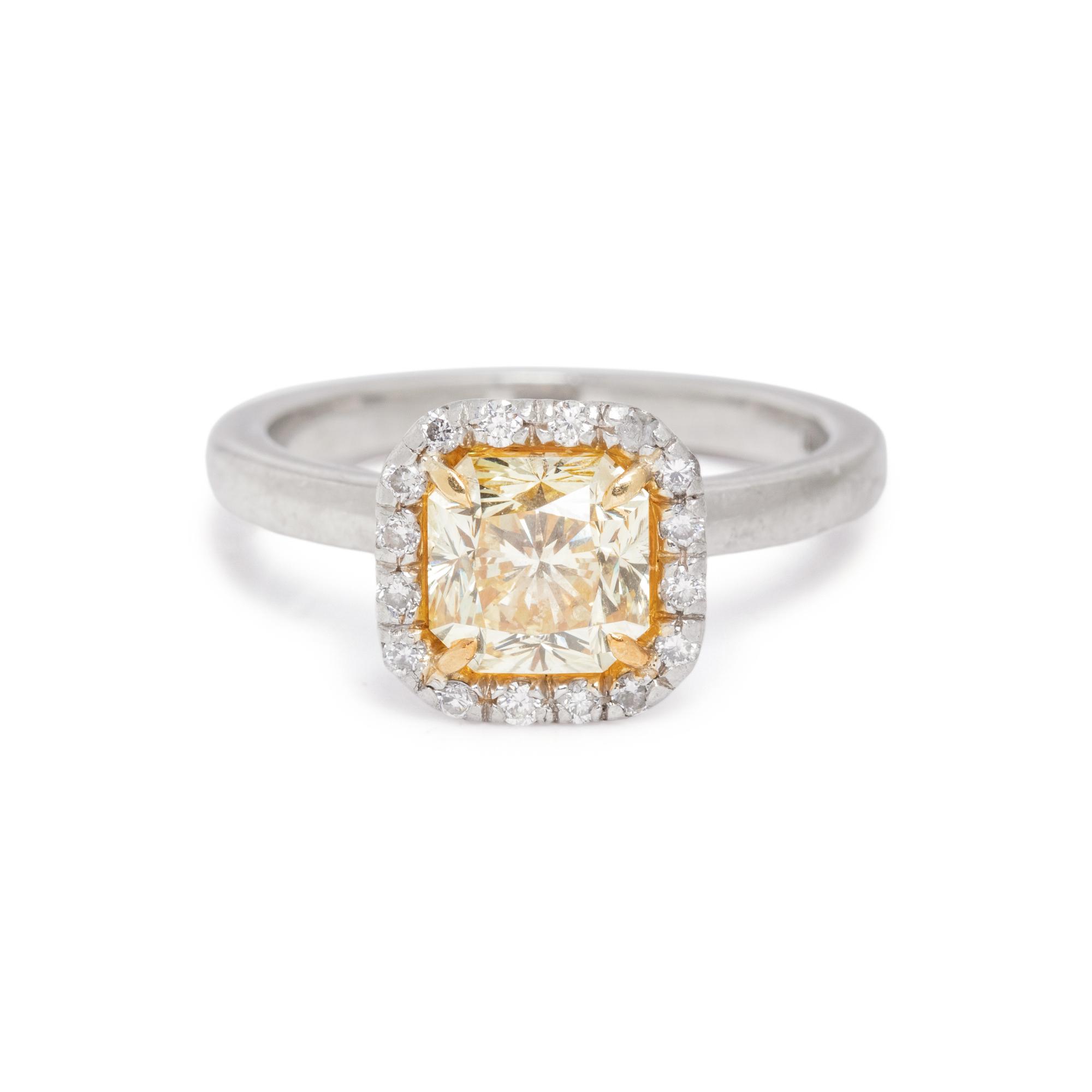 FANCY INTENSE YELLOW DIAMOND AND DIAMOND RING