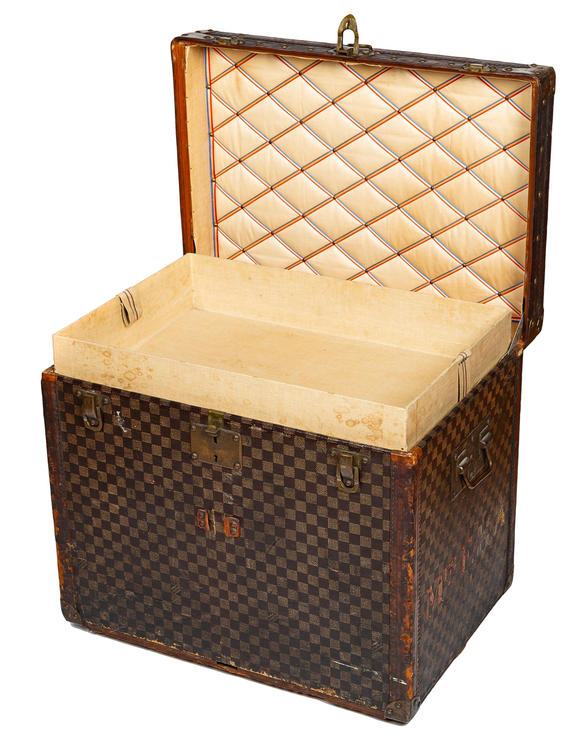 A Louis Vuitton Vintage Damier Steamer Trunk, 20.5" H x 23.5" W x 16.5" D.