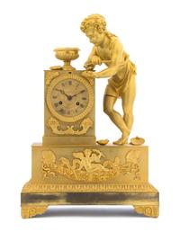 An Empire Gilt Bronze Mantel Clock Height 20 1/4 inches. — EARLY 19TH CENTURY