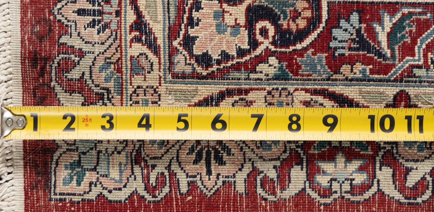 A Qom Wool Rug