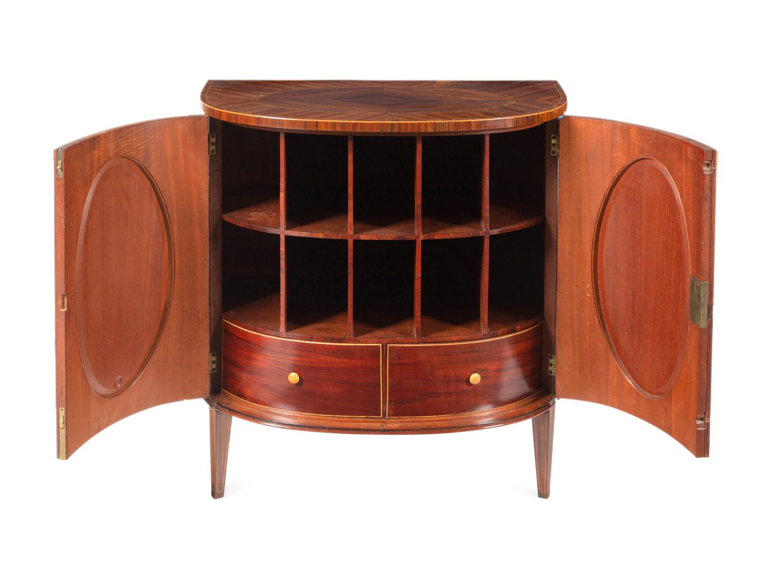 A Pair of George III Goncalo Alves Demilune Cabinets