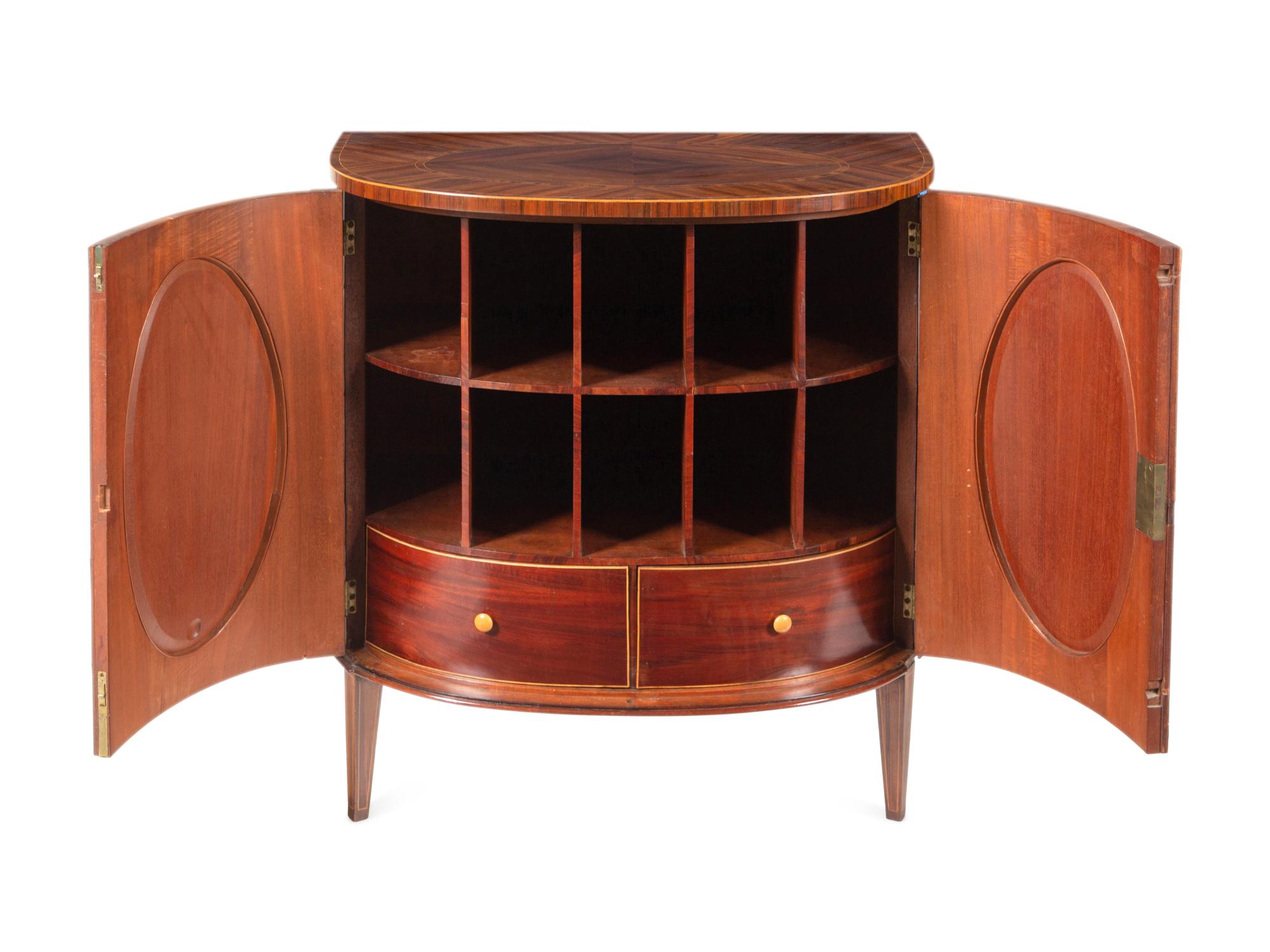 A Pair of George III Goncalo Alves Demilune Cabinets