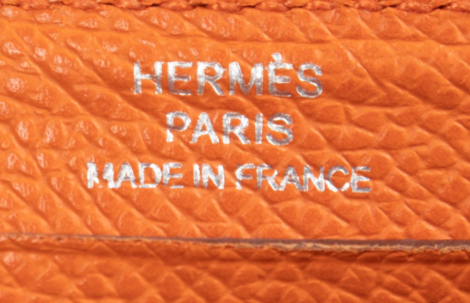 Three Hermès Items: One Ostrich Folio and Two Leather Zip Wallets, 2000-2008