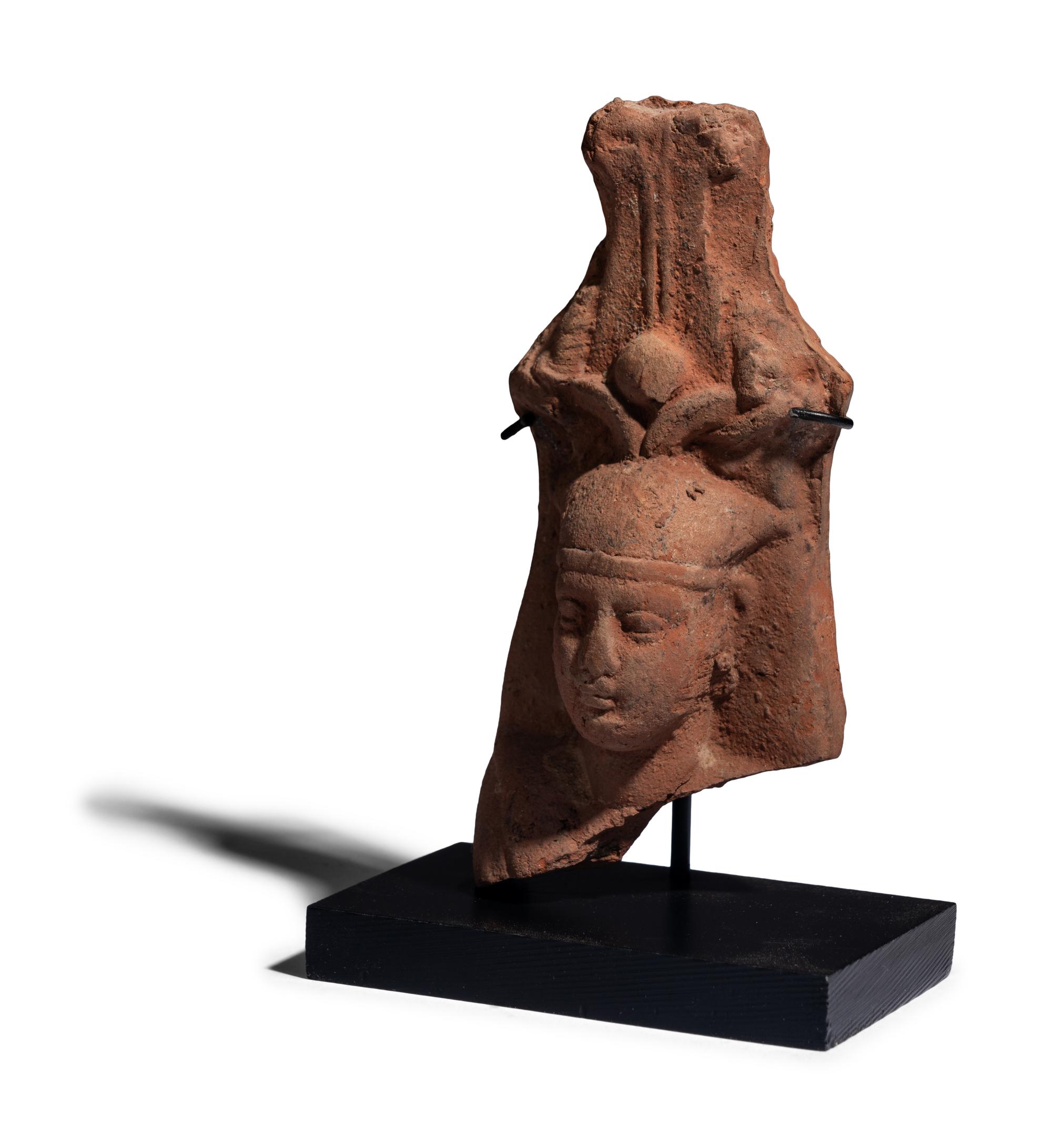 An Egyptian Terracotta Head of the God Osiris