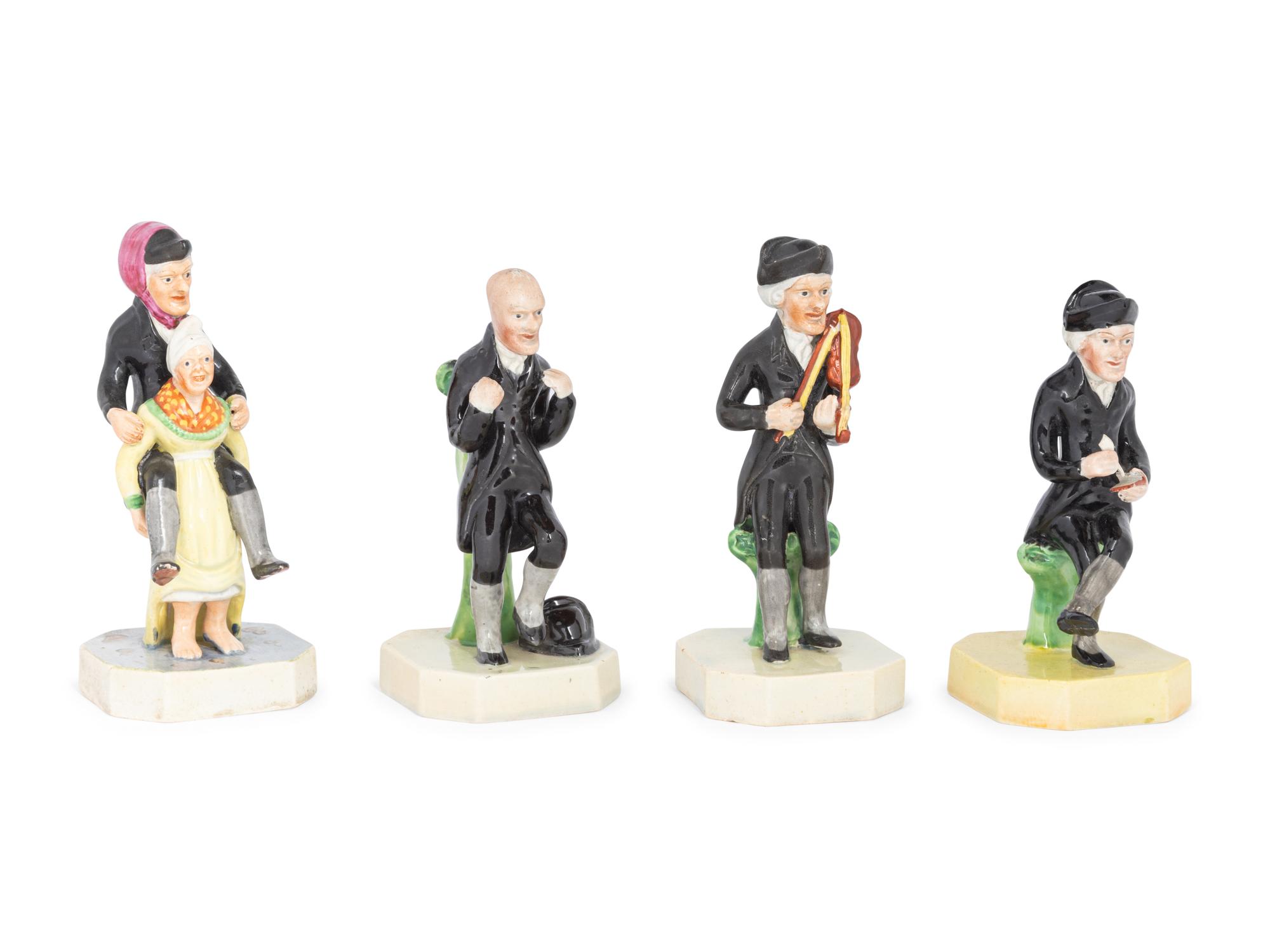A Group of Four Staffordshire Pearlware Dr. Syntax Figures