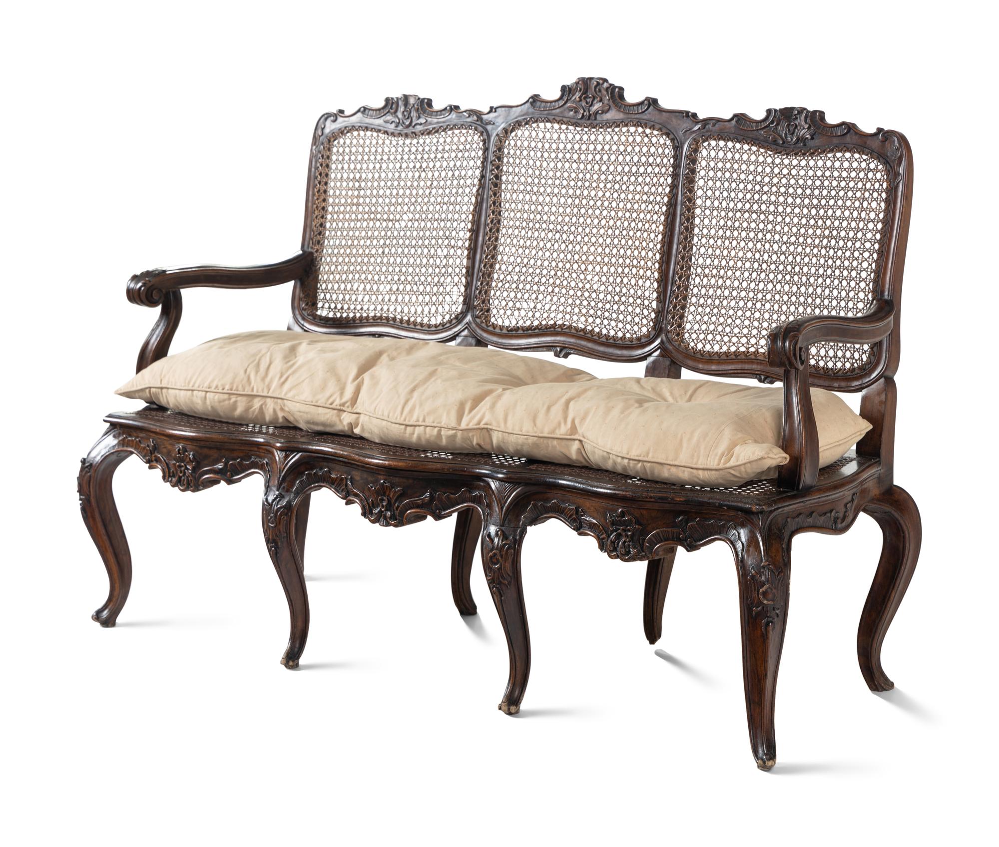An Italian Rococo Style Carved Walnut Settee