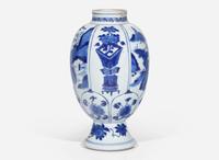 A Chinese blue and white ovoid footed jar, Kangxi period 青花橄欖瓶 清 康熙
