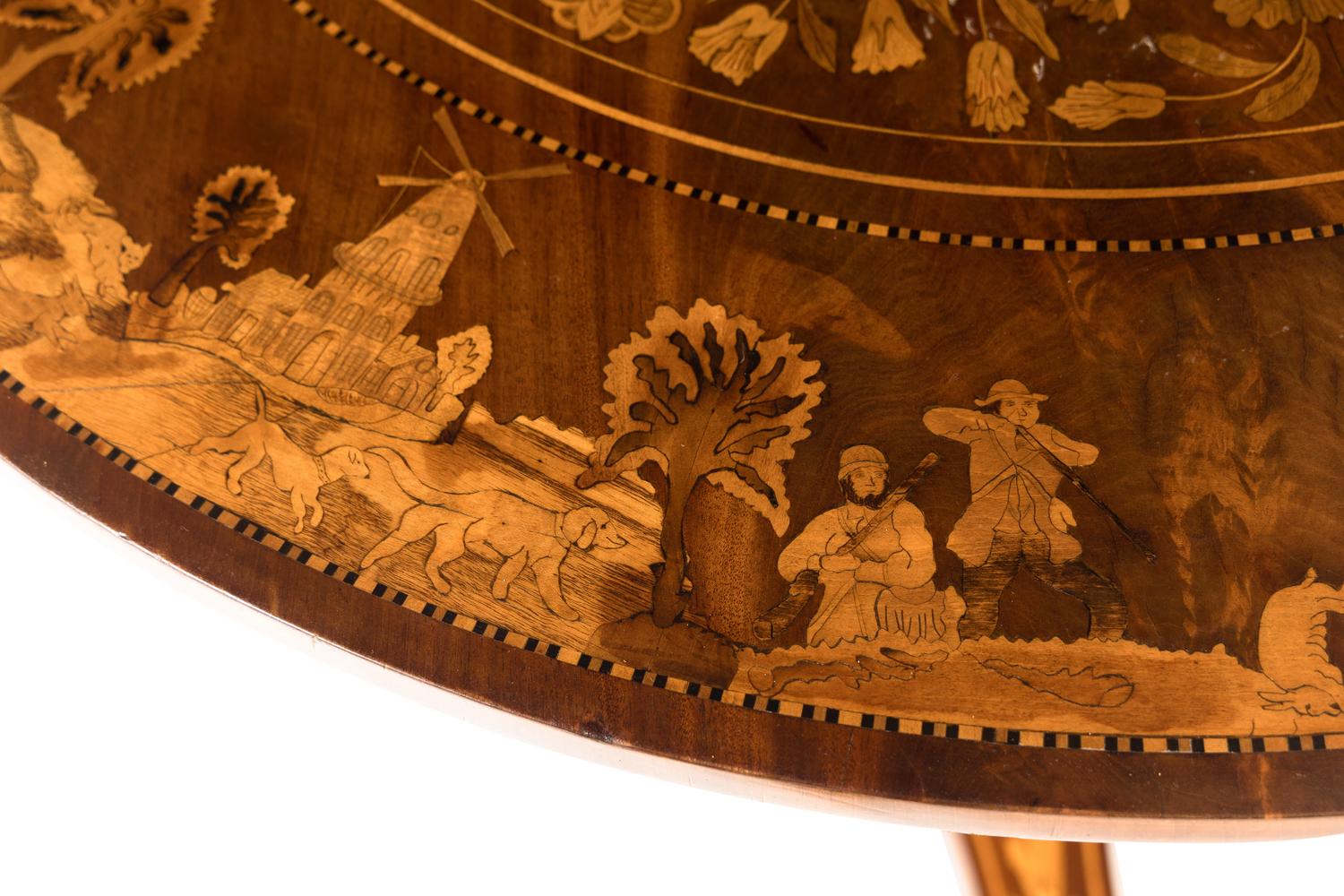 A Dutch Mahogany and Marquetry Center Table