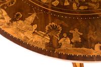 A Dutch Mahogany and Marquetry Center Table
