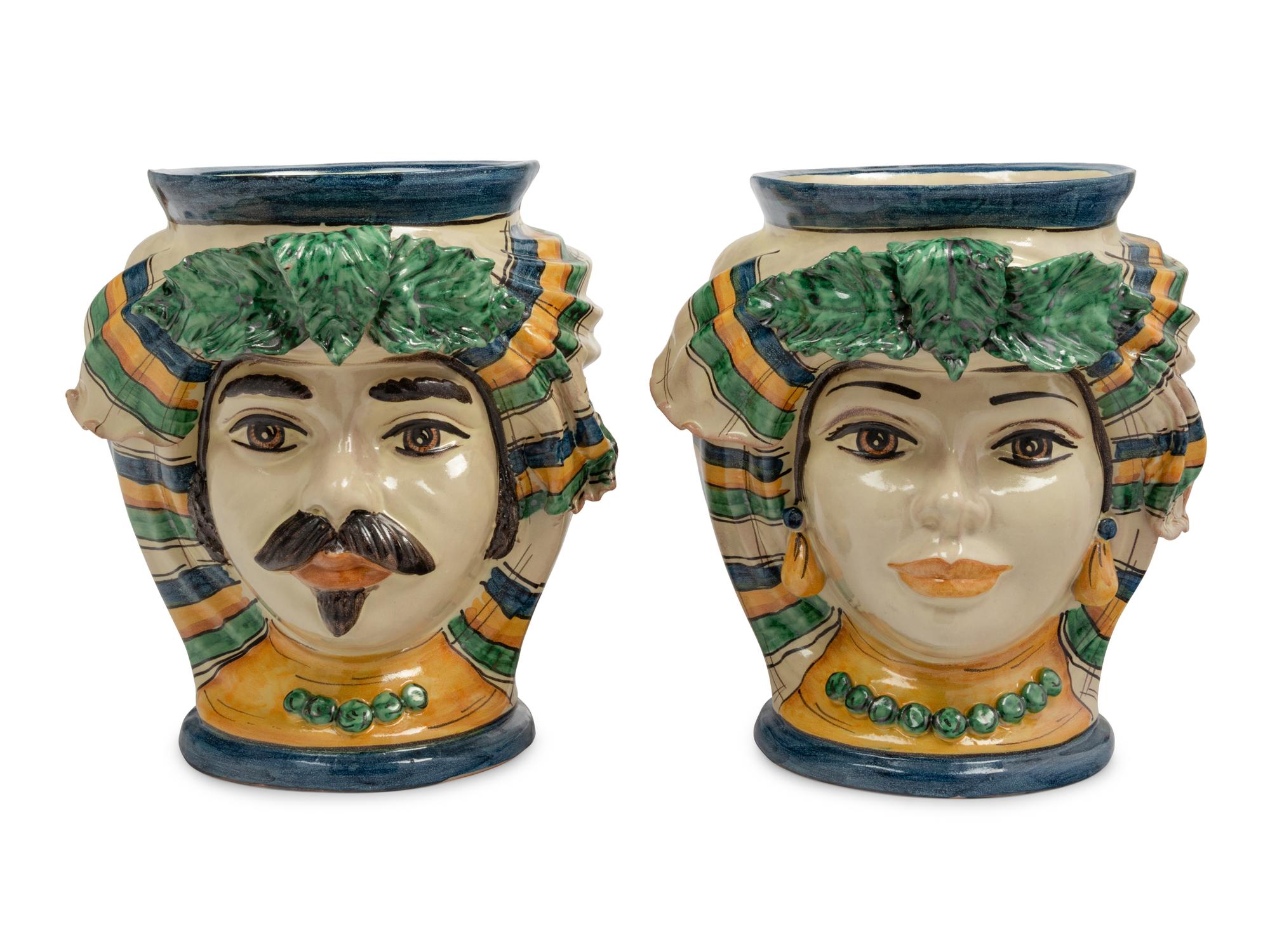 A Pair of Italian Polychrome Glazed Pottery Figural Vases