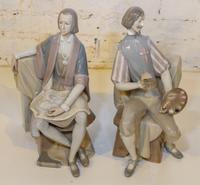 A Pair of Lladro Figures. Height 14 1/4 inches.