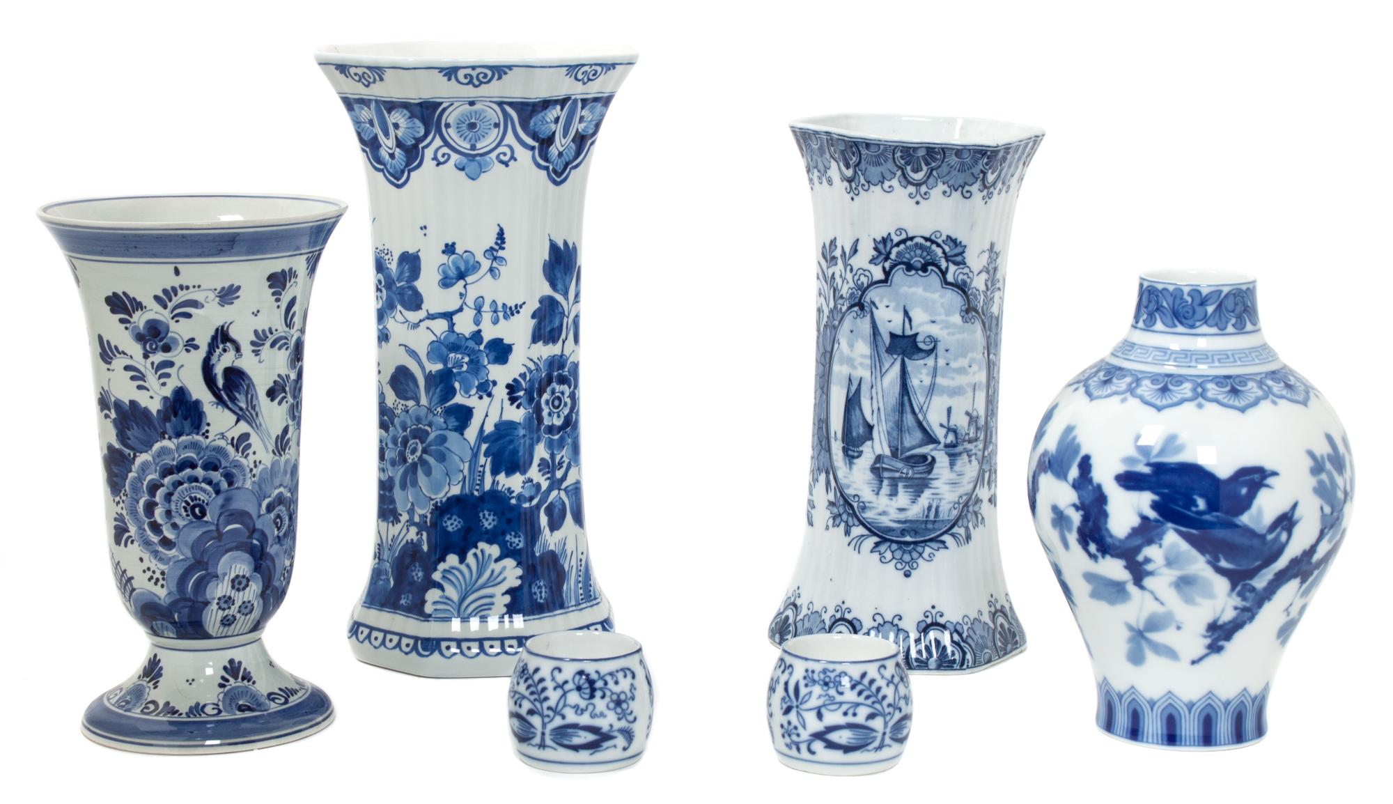 Four Delft Blue and White Porcelain Articles Height of tallest 11 inches.