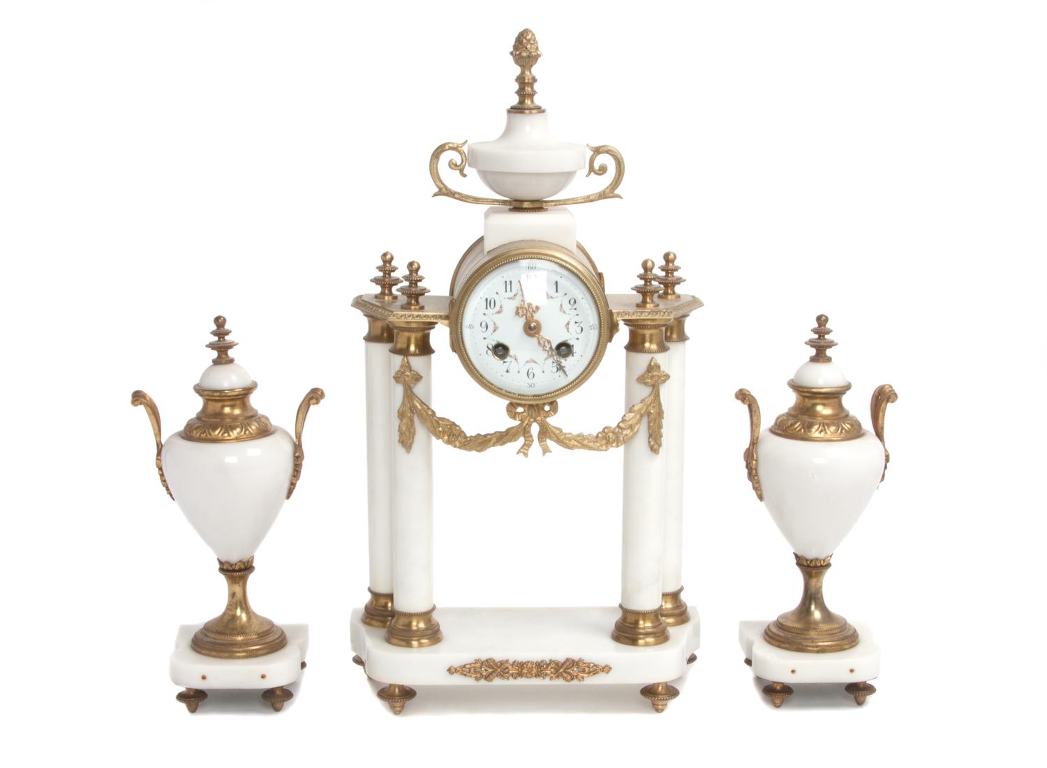 A Three-Piece Marble Clock Garniture Height 16 1/2 inches. — LATE 19TH/EARLY 20TH CENTURY