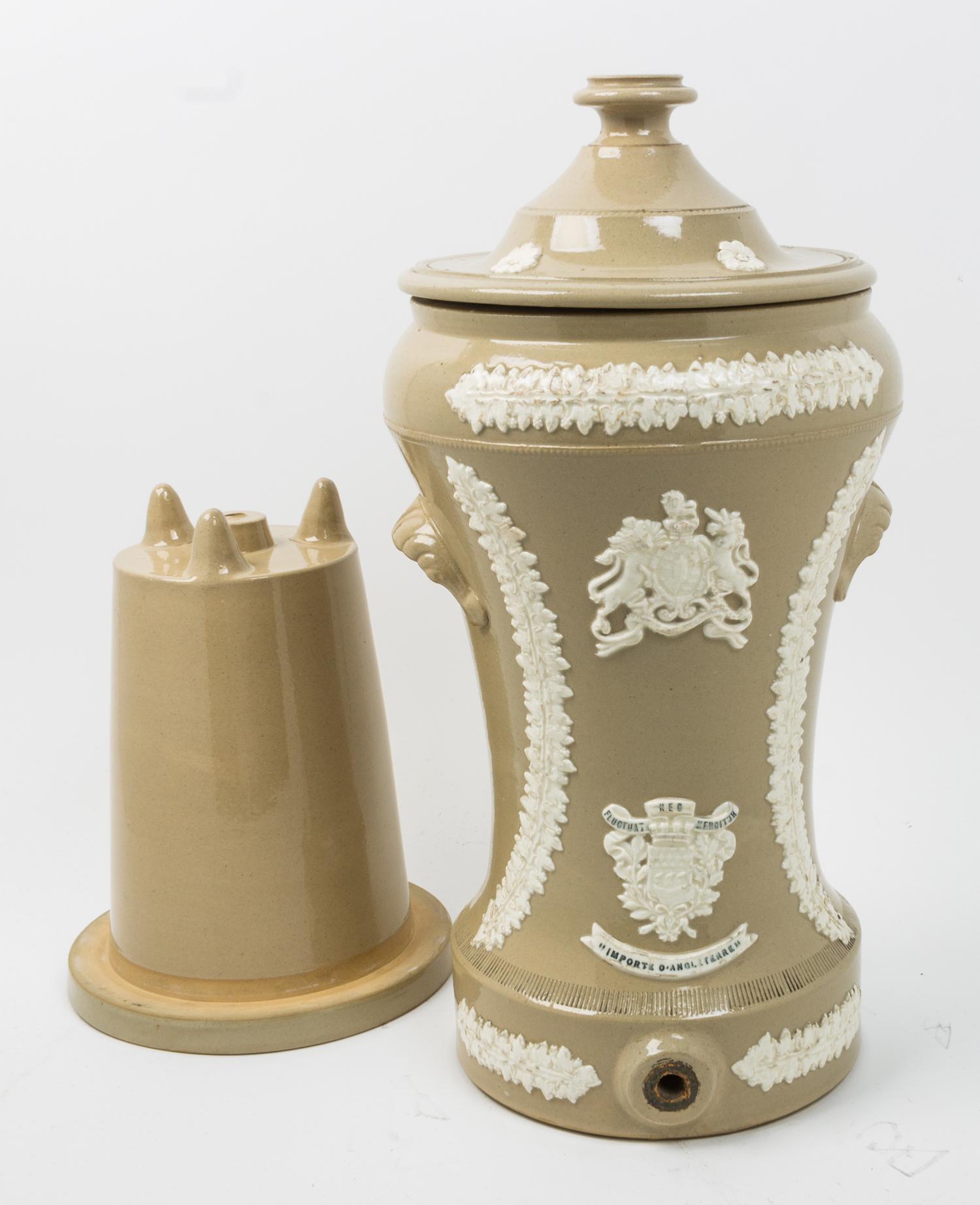 A Victorian Stoneware Liquor Dispenser Height 22 inches. — LATE 19TH CENTURY