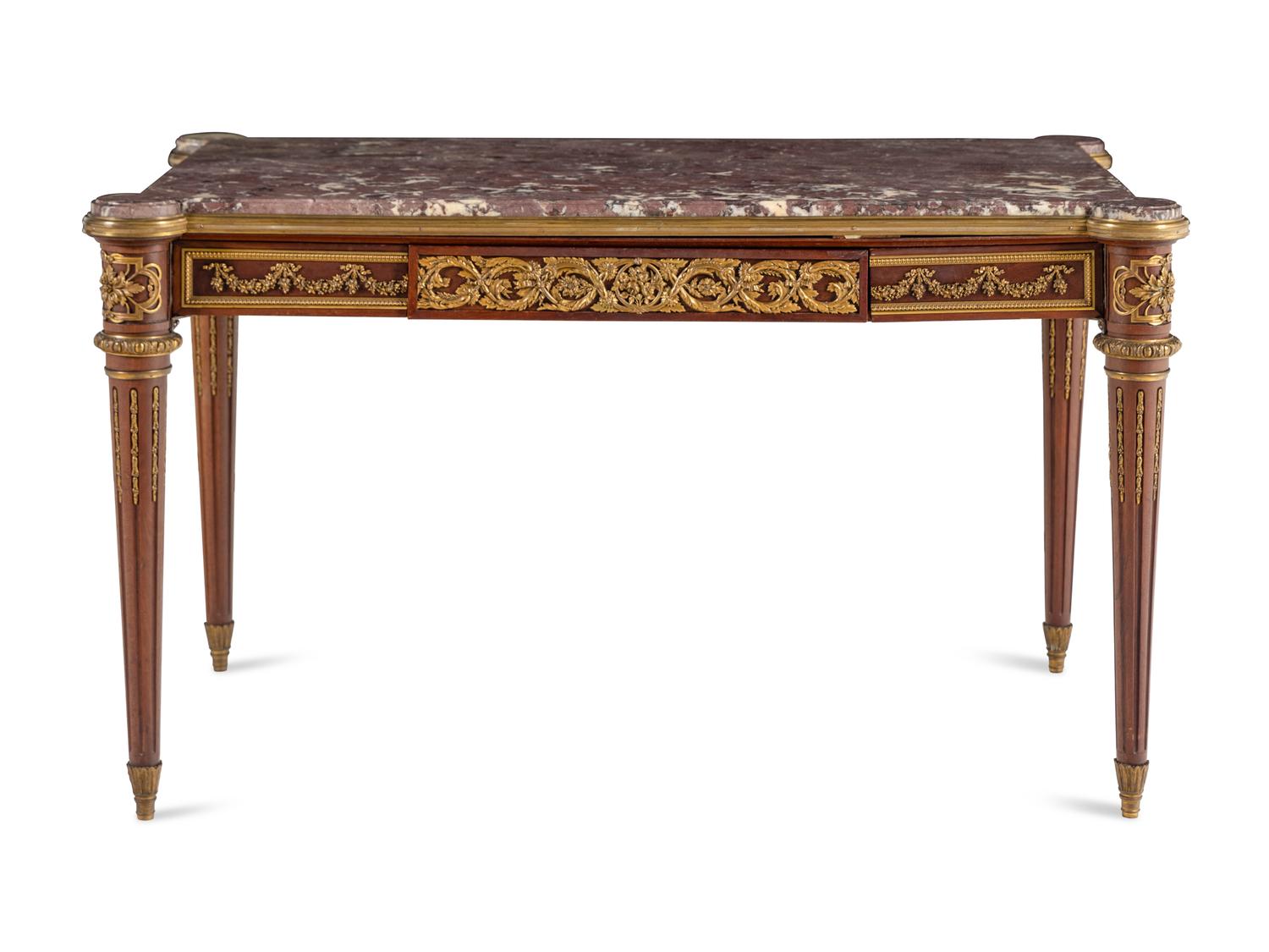 A Louis XVI Style Gilt Bronze Mounted Mahogany Marble-Top Center Table