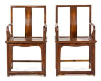 A Pair of Chinese Hardwood Armchairs Height 39 x width 23 x depth 17 1/2 inches. — 20TH CENTURY