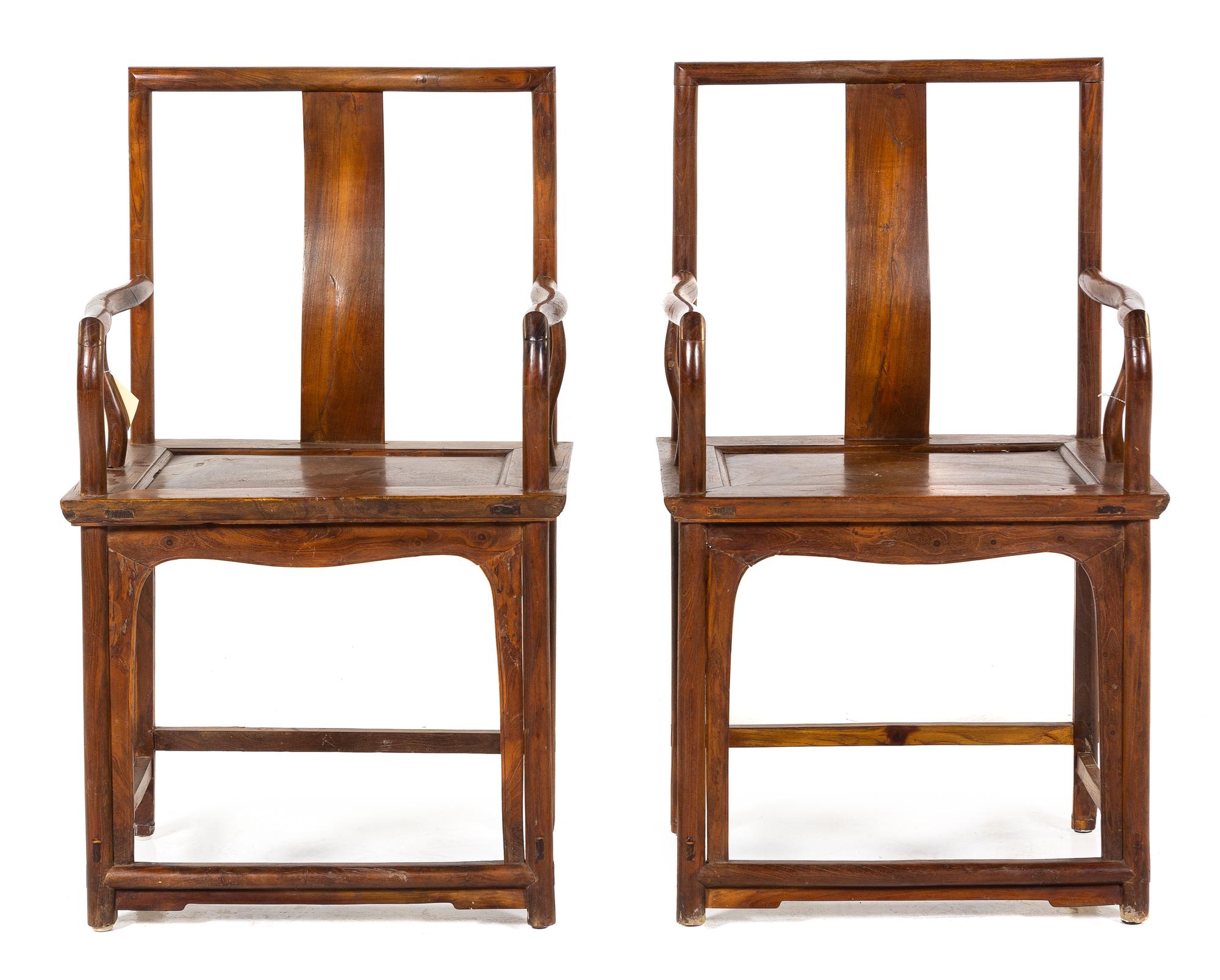 A Pair of Chinese Hardwood Armchairs Height 39 x width 23 x depth 17 1/2 inches. — 20TH CENTURY