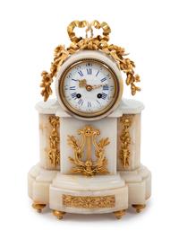 A Louis XVI Style Gilt Bronze Mounted Onyx Mantel Clock
