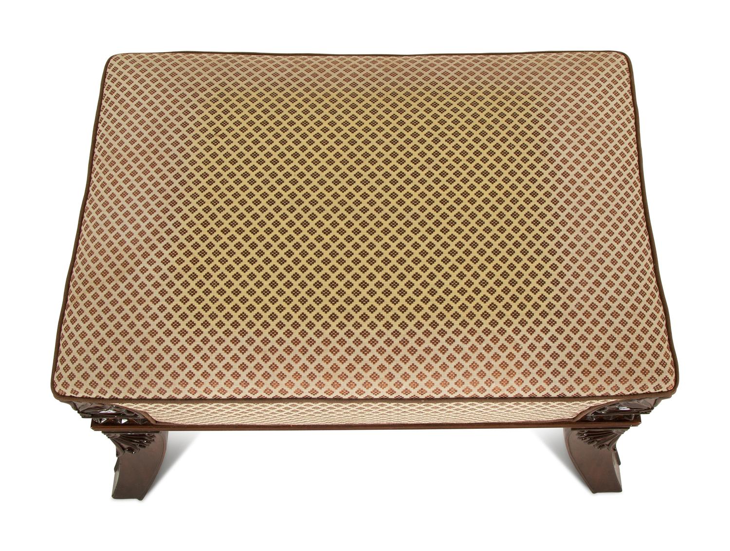 An Egyptian Revival Carved Mahogany Ottoman with Upholstered Seat — 20th Century